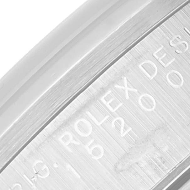 This image shows a close-up of the engraved inner bezel of a Rolex Date 15200 Men's Stainless Steel Black Dial 15200 Men's Stainless Steel Black Dial watch.