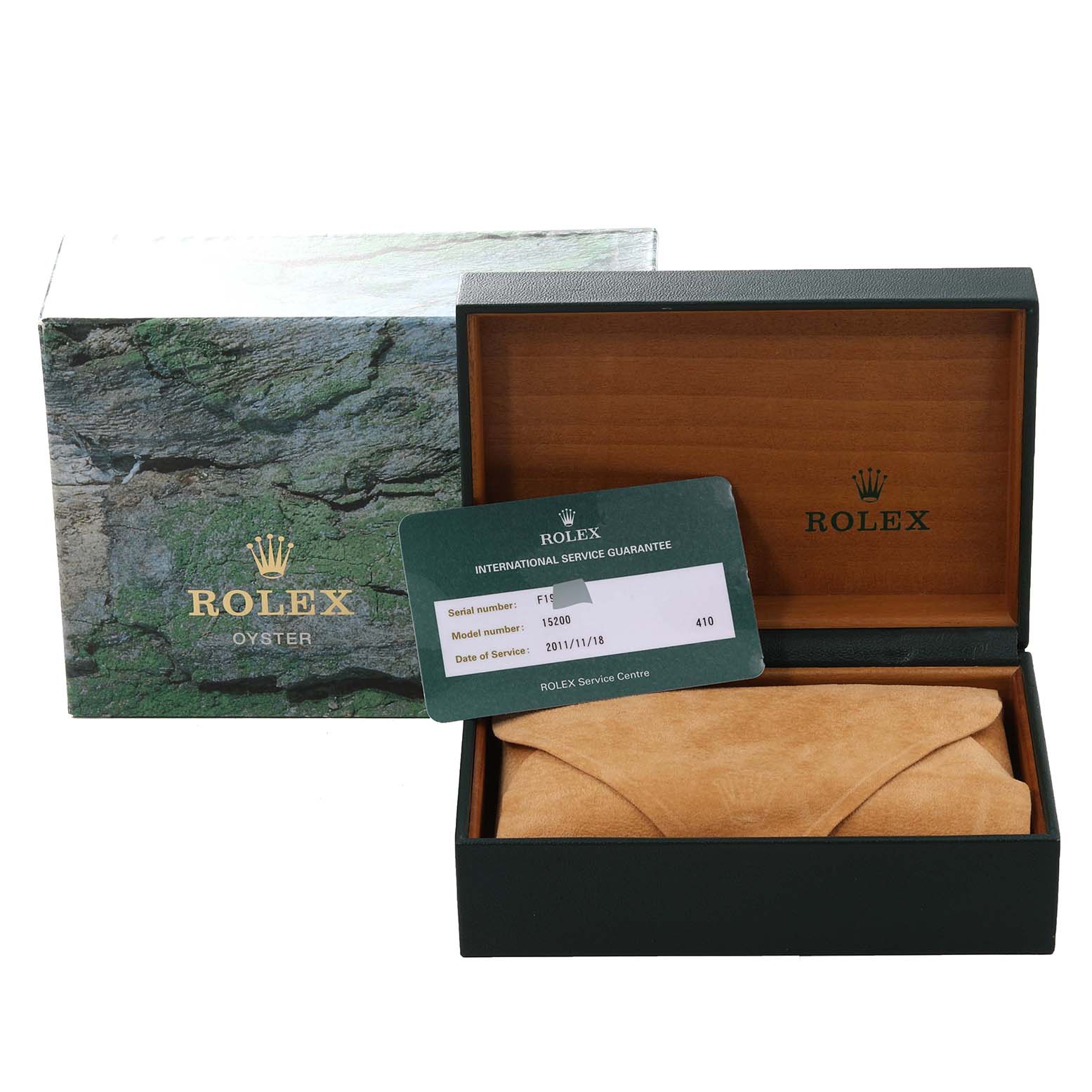 The image shows the box and international service guarantee card for a Rolex Date 15200 Men's Stainless Steel Black Dial 15200 Men's Stainless Steel Black Dial model watch.