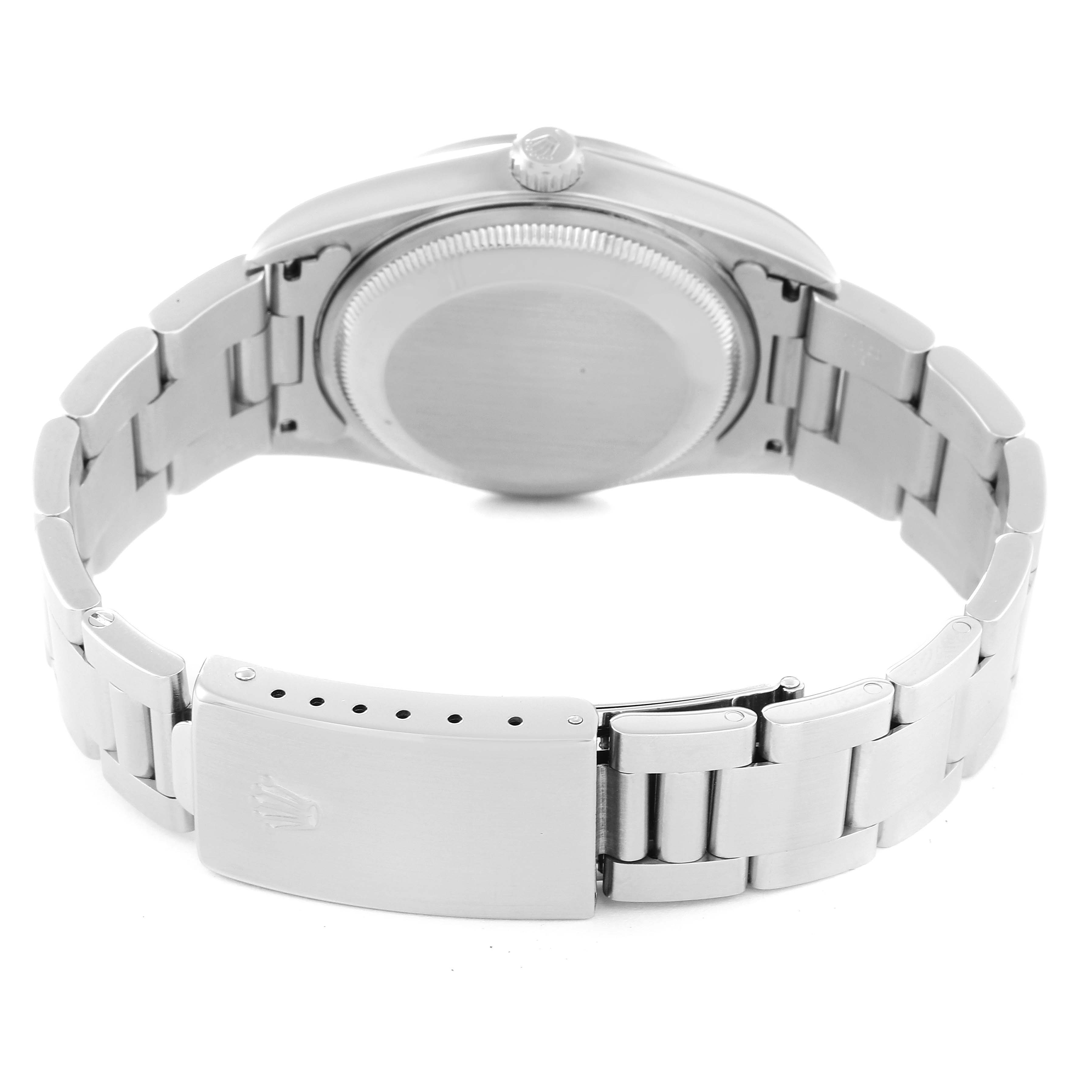 The image shows the back case, crown, and bracelet of a Rolex Date 15200 Men's Stainless Steel Blue Dial 15200 Men's Stainless Steel Blue Dial model watch at a rear angle.