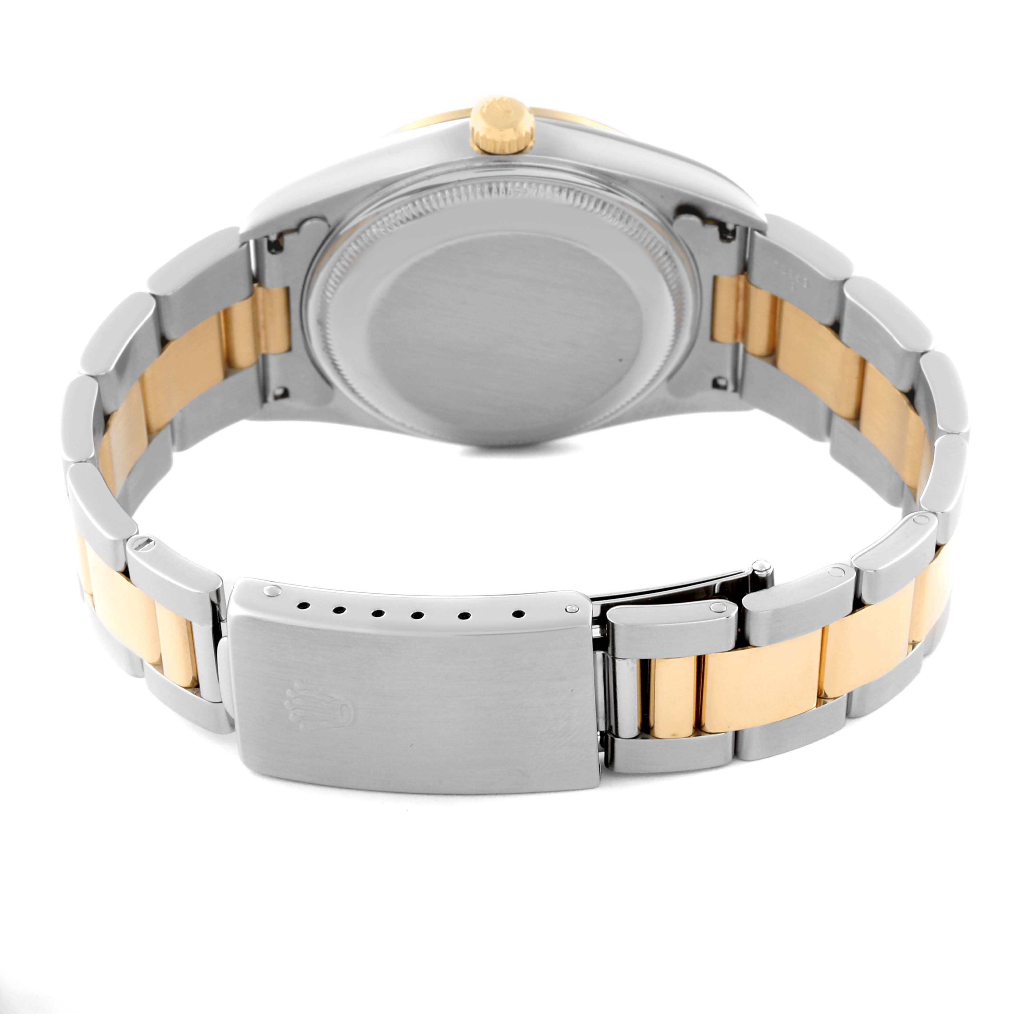 This image shows the backside and clasp of a Rolex Date 15203 Men's Steel and Gold (two tone) Champagne Dial 15203 Men's Steel and Gold (two tone) Champagne Dial model watch, highlighting its two-tone bracelet.