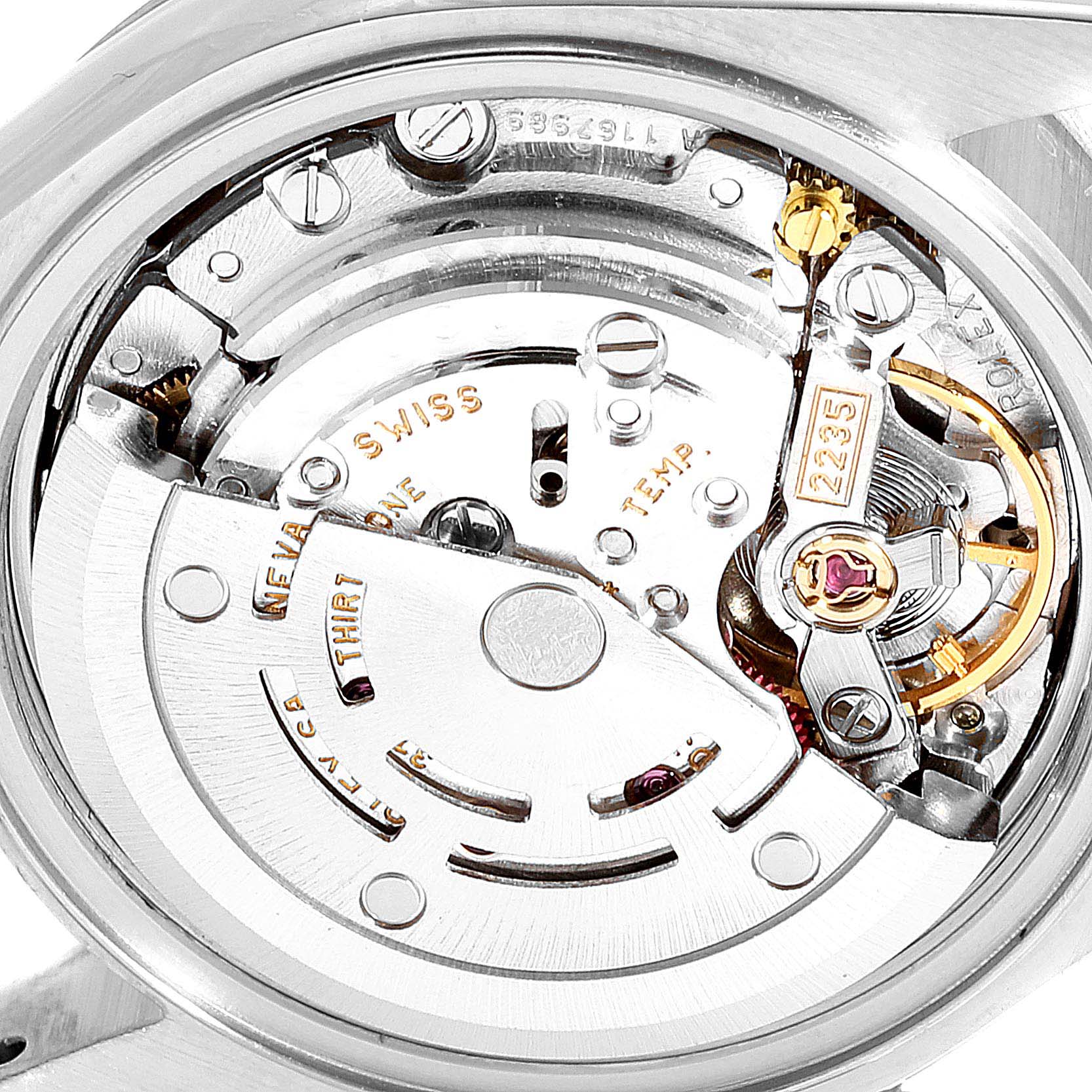 This image shows the internal mechanical movement of a Rolex Datejust 79174 Women's Stainless Steel Pink Dial 79174 Women's Stainless Steel Pink Dial watch, including gears and the rotor.