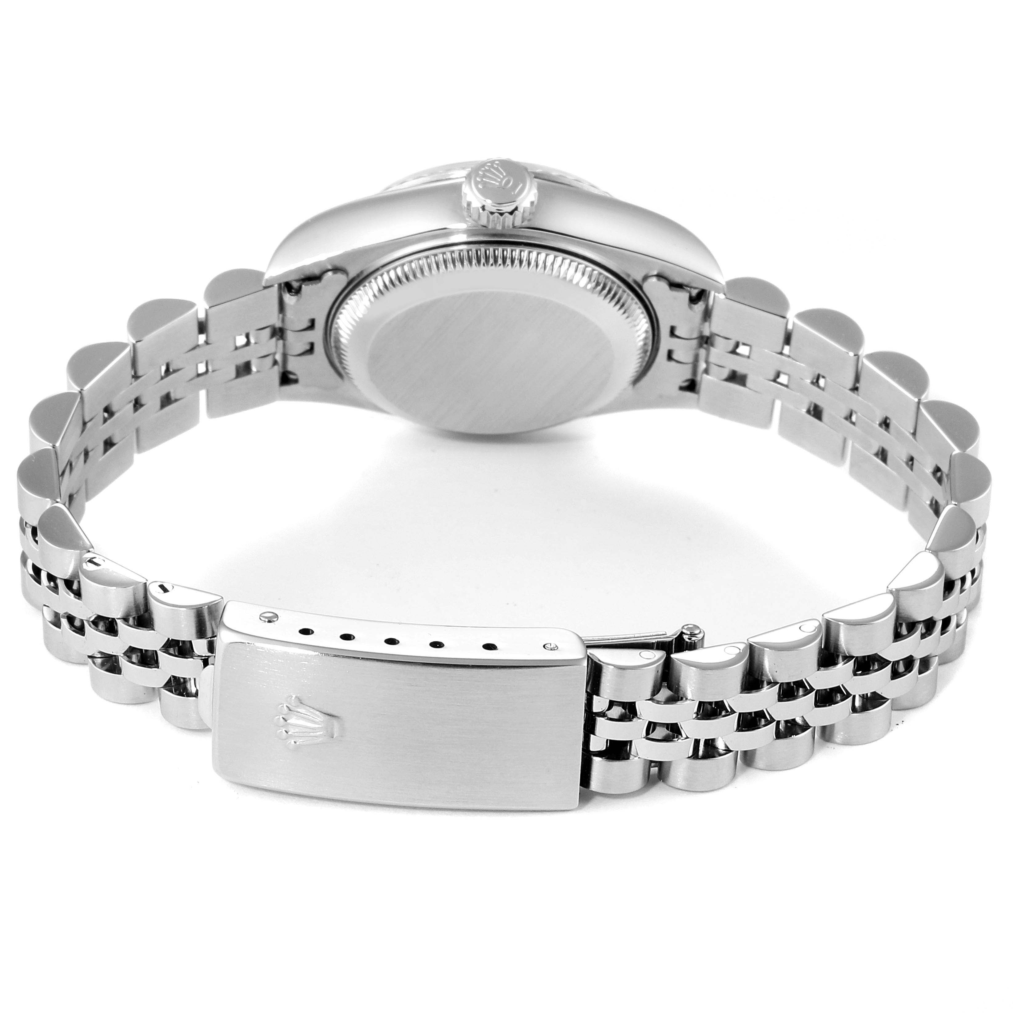 This image shows the backside of a Rolex Datejust 79174 Women's Stainless Steel Pink Dial 79174 Women's Stainless Steel Pink Dial watch, highlighting the clasp, bracelet, and case back.