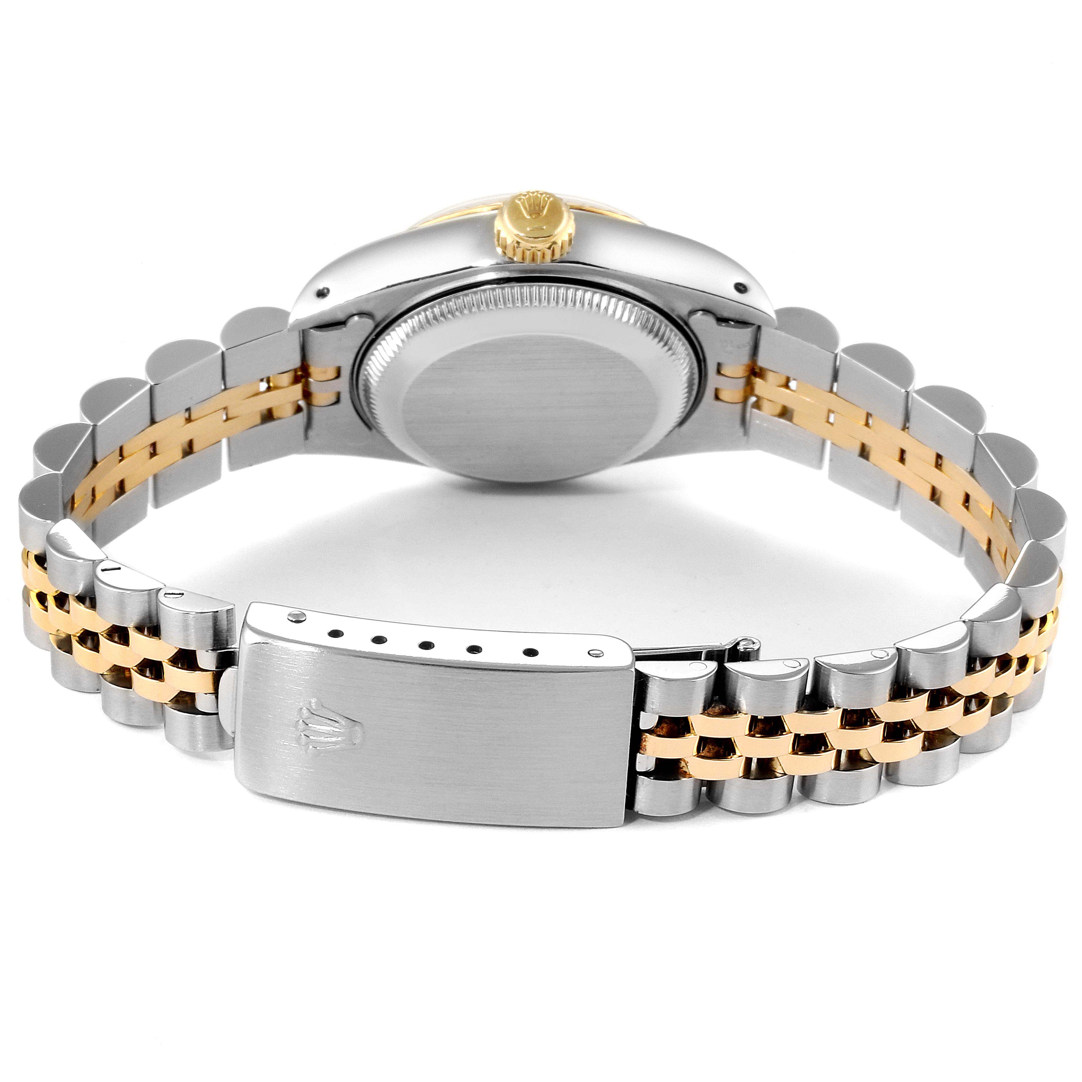 This image shows the back side of the Rolex Datejust 69173 Women
s Steel and Gold (two tone) Champagne Dial 69173 Women
s Steel and Gold (two tone) Champagne Dial watch, including the case back, crown, and two-tone bracelet.
