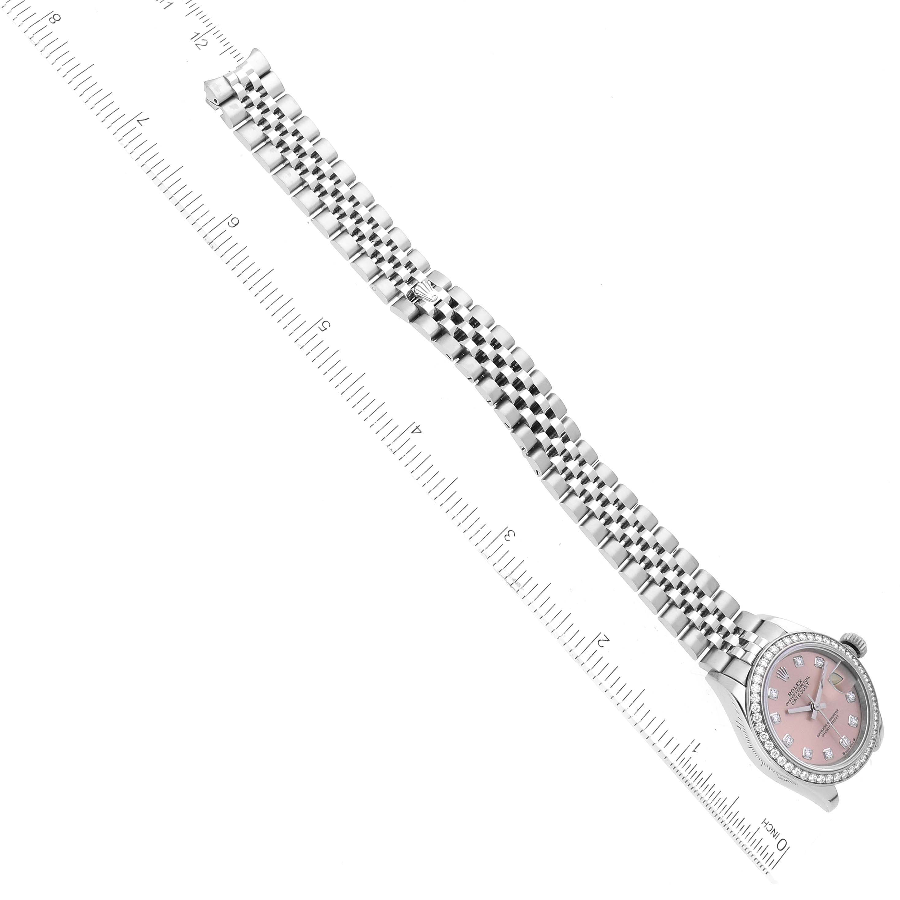 This image shows a Rolex Datejust 279384 Women's Stainless Steel Pink Dial 279384 Women's Stainless Steel Pink Dial watch at an oblique angle, highlighting its bracelet and the face with a pink dial.