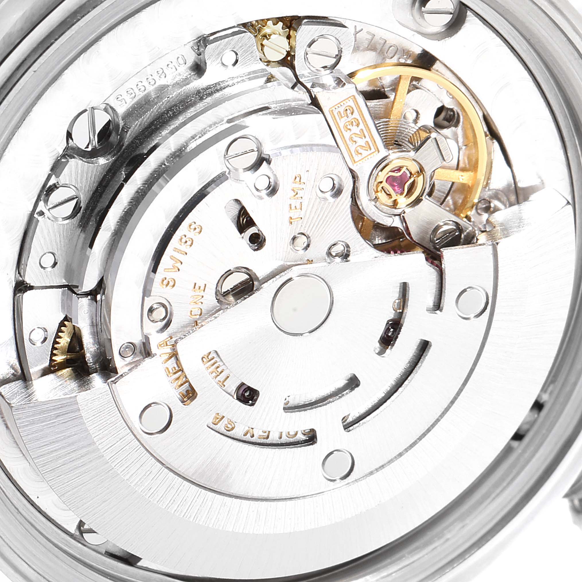 This image shows a close-up view of the movement inside a Rolex Mid-Size 78240 Women
s Stainless Steel Blue Dial 78240 Women
s Stainless Steel Blue Dial model watch.