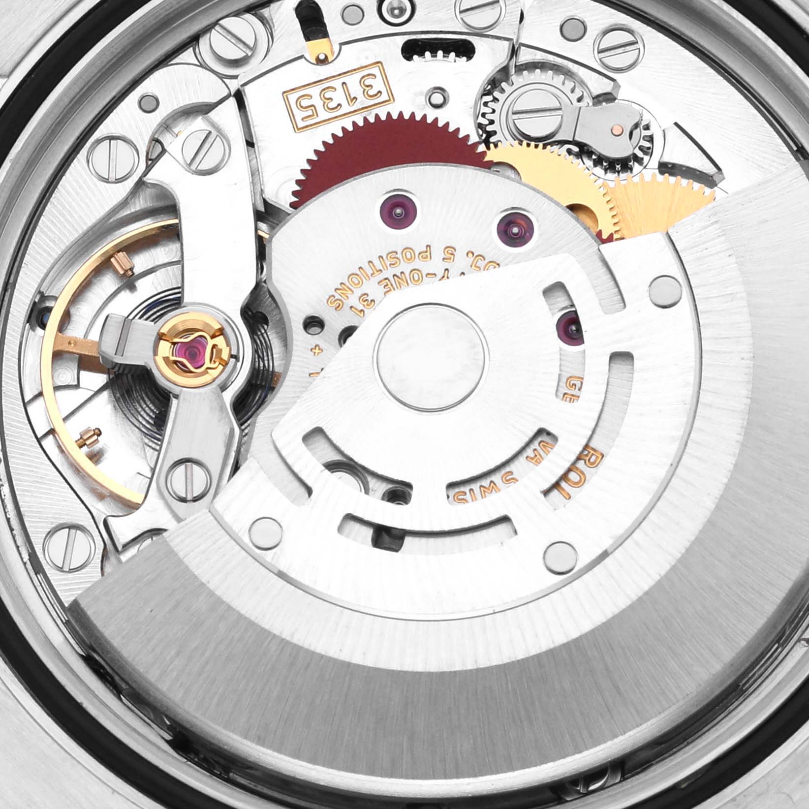 This image shows a close-up view of the movement inside a Rolex Datejust 116231 Men's Steel and Gold (two tone) Silver Dial 116231 Men's Steel and Gold (two tone) Silver Dial watch.