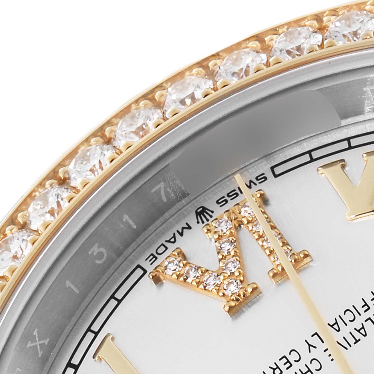 This close-up image of the Rolex Datejust 126283 Men's Steel and Gold (two tone) Silver Dial 126283 Men's Steel and Gold (two tone) Silver Dial watch shows a section of the diamond-encrusted bezel and part of the dial.