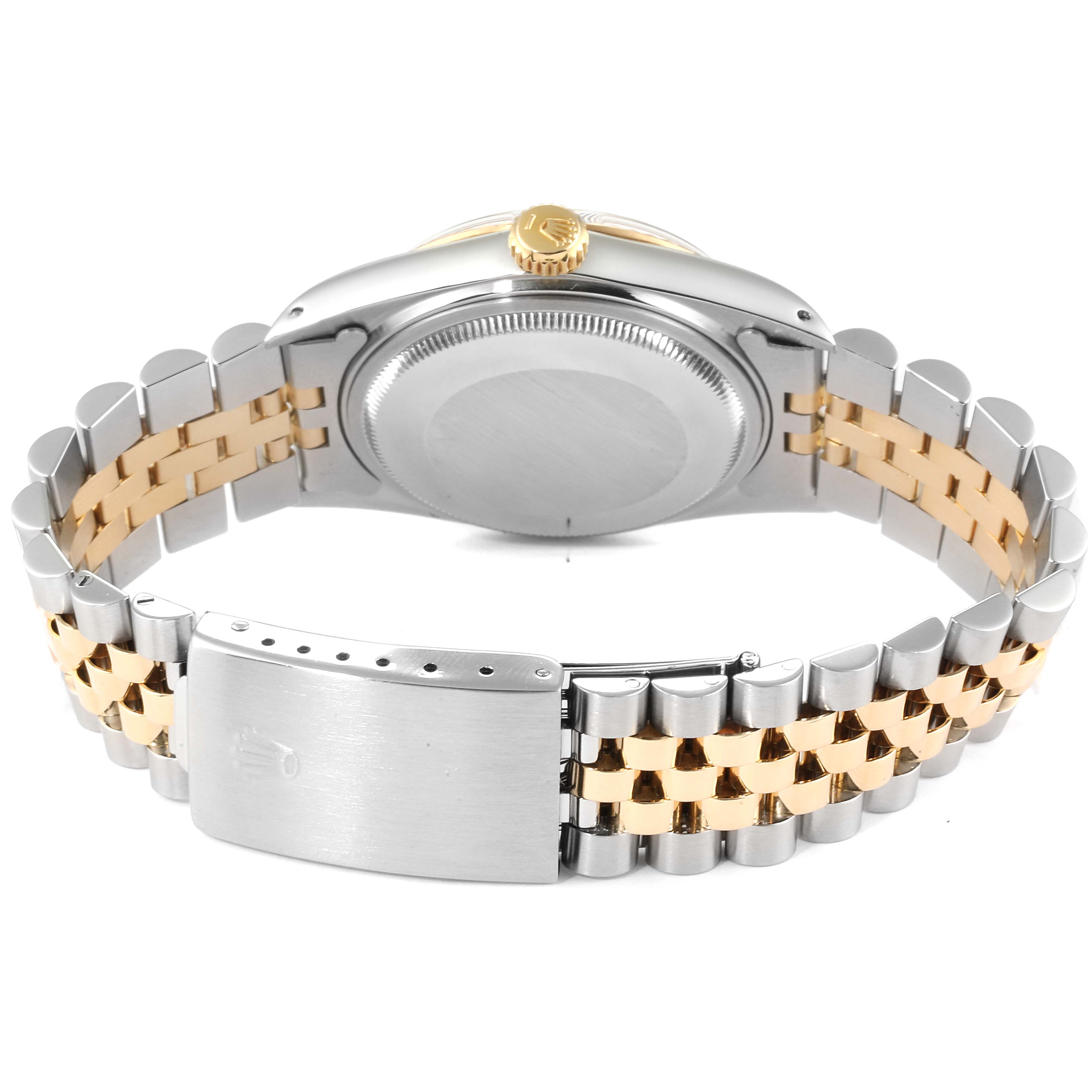 This image shows the rear view of a Rolex Datejust 16013 Men's Steel and Gold (two tone) Champagne Dial 16013 Men's Steel and Gold (two tone) Champagne Dial watch, highlighting the case back and two-tone metal bracelet.