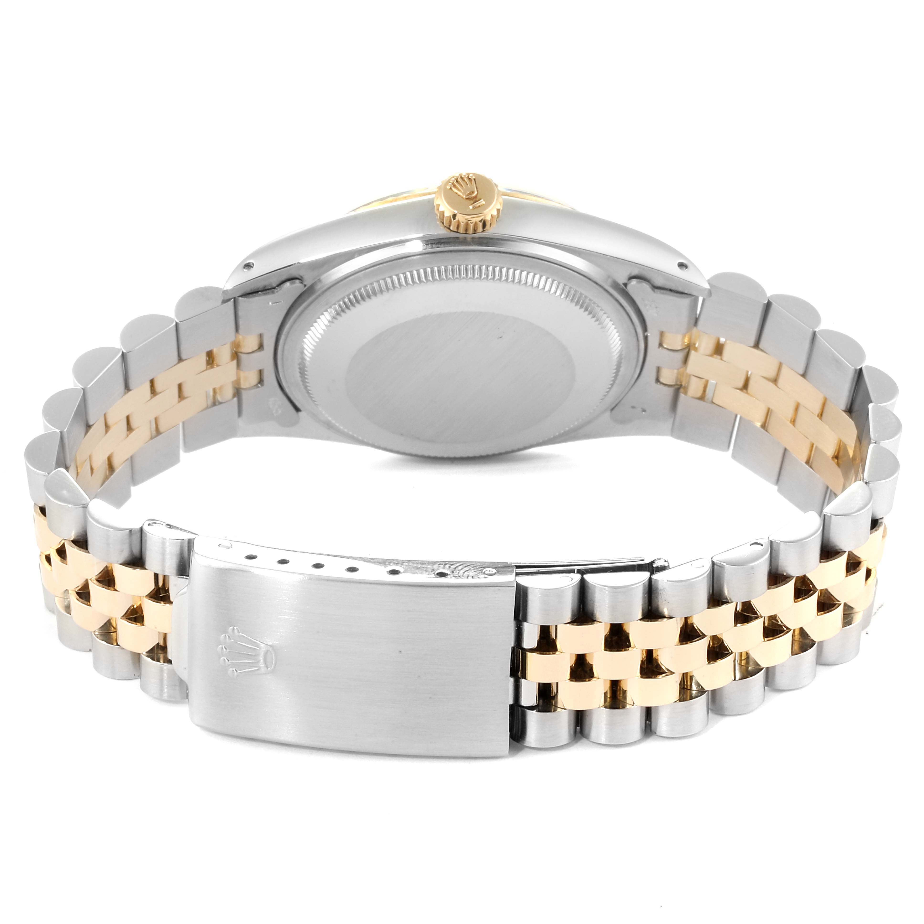 The image shows the back and clasp of a Vintage Collection Rolex watch, including its two-tone bracelet and case back.