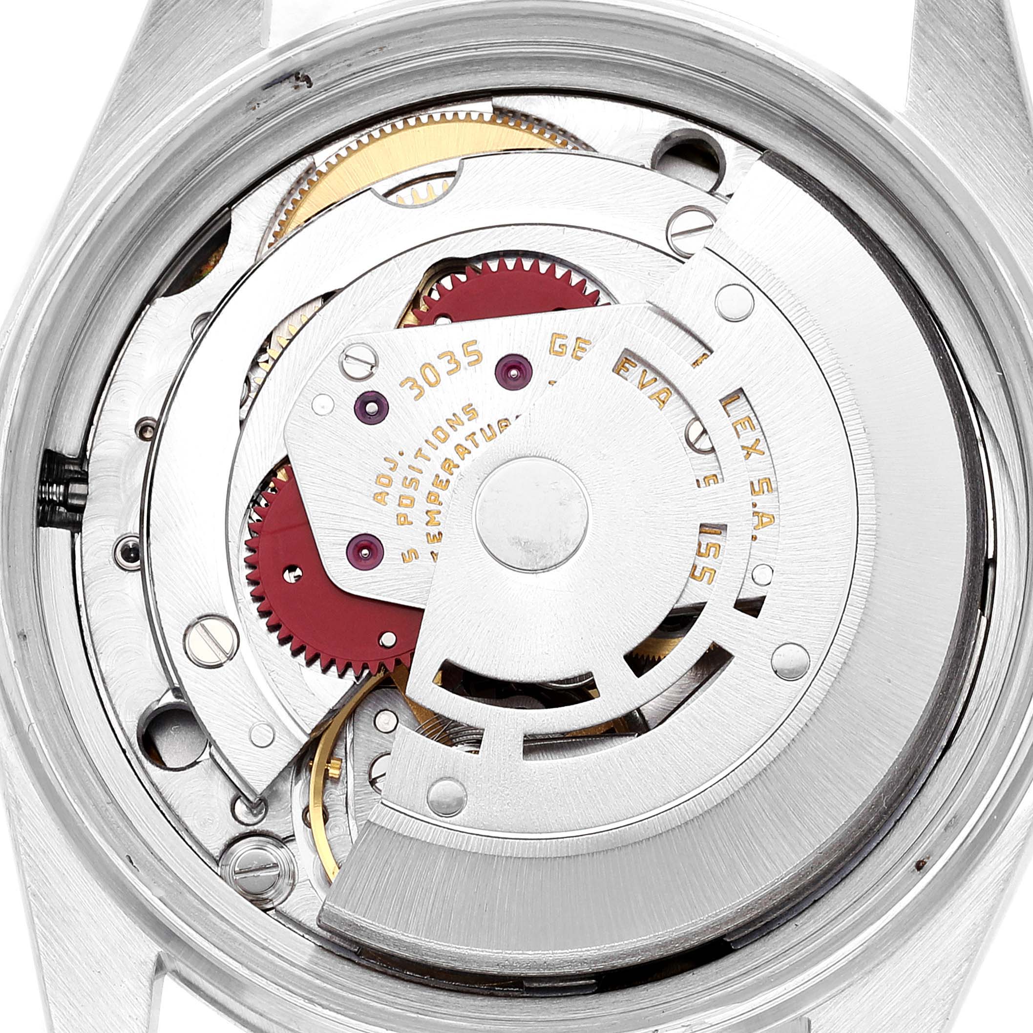 The image shows the internal mechanism of a Rolex Vintage Collection 16013 Men's Steel and Gold (two tone) Silver Dial 16013 Men's Steel and Gold (two tone) Silver Dial watch from the back angle.