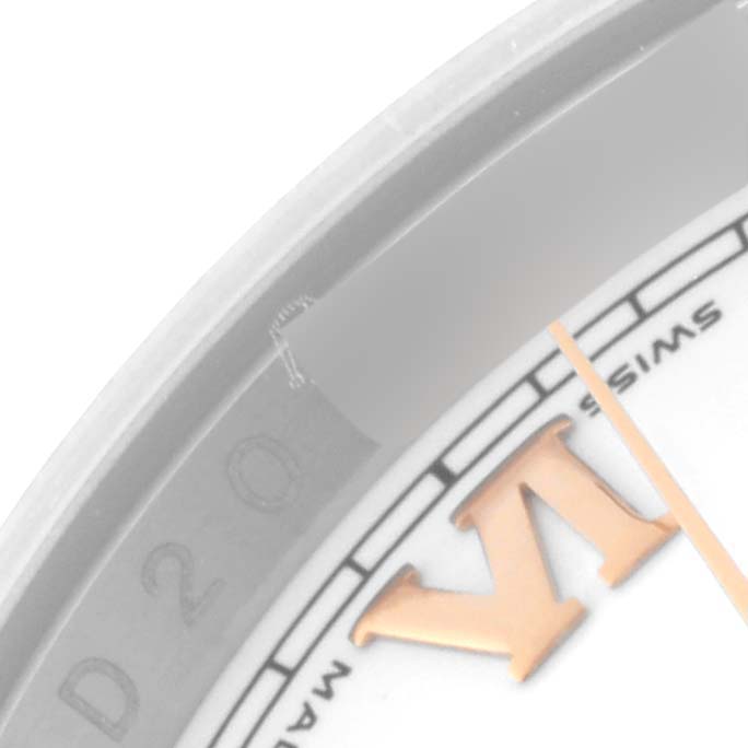 This image shows a close-up of the dial on a Rolex Datejust 116231 Men's Steel and Gold (two tone) White Dial 116231 Men's Steel and Gold (two tone) White Dial watch, focusing on part of the Roman numeral 'X' and 'Swiss Made'.