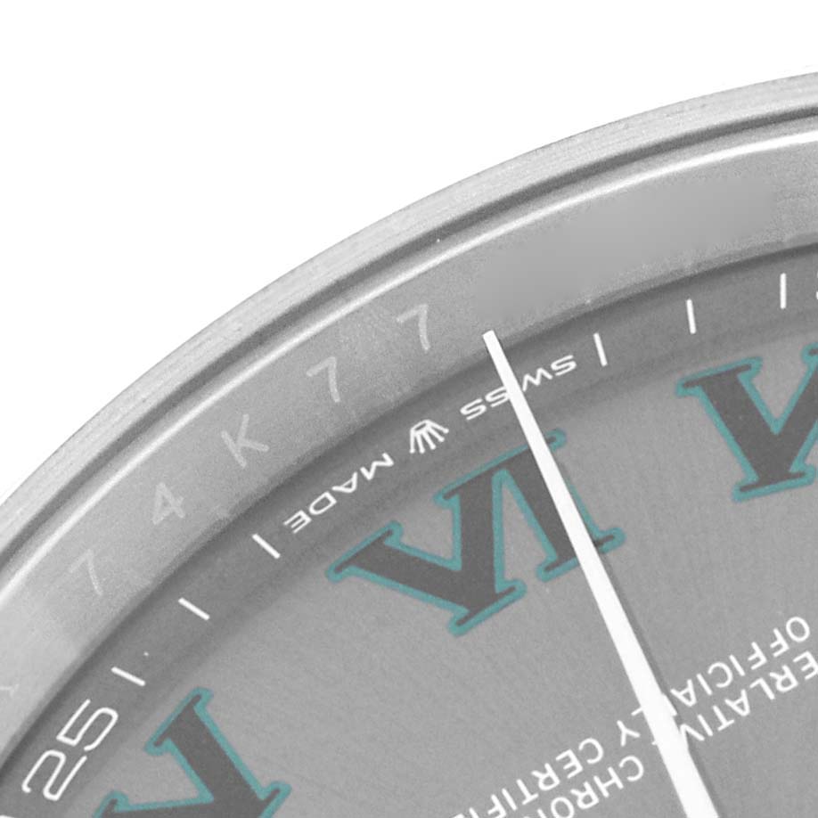 The image shows a close-up of the dial and the bezel of a Rolex Datejust 41 126300 Men's Stainless Steel Grey Dial 126300 Men's Stainless Steel Grey Dial watch.