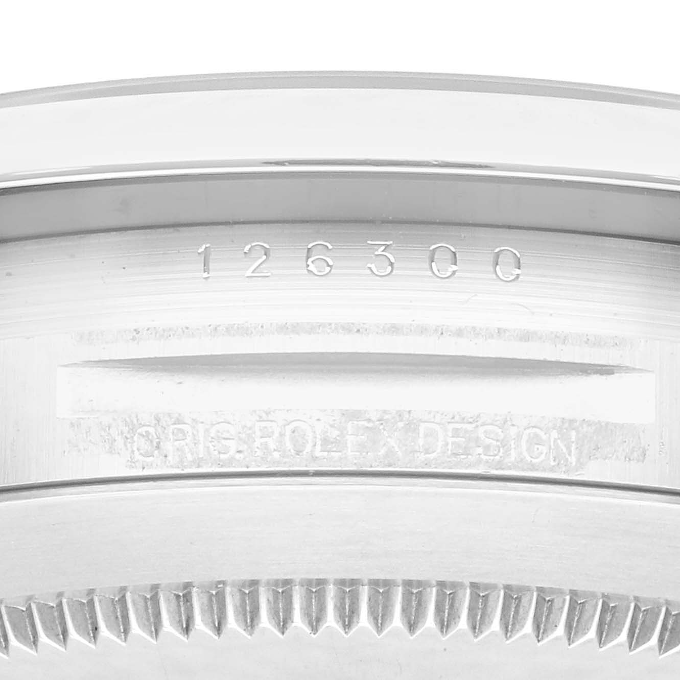 The image shows a close-up of the case back with inscriptions on the Rolex Datejust 41 126300 Men's Stainless Steel Grey Dial 126300 Men's Stainless Steel Grey Dial model.