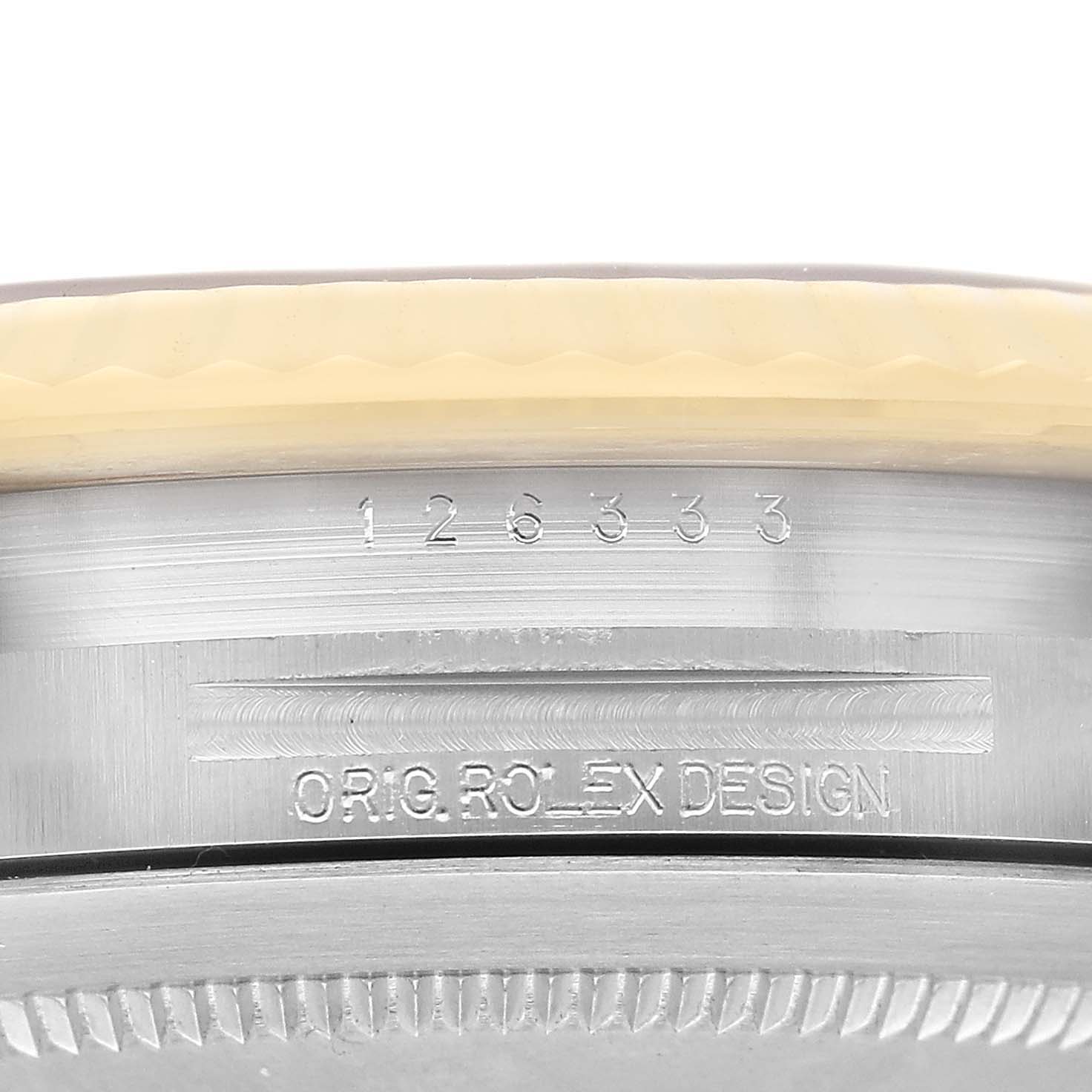The image shows the side of the Rolex Datejust 41 126333 Men's Steel and Gold (two tone) Black Dial, featuring the serial number and "ORIG. ROLEX DESIGN" engraving.