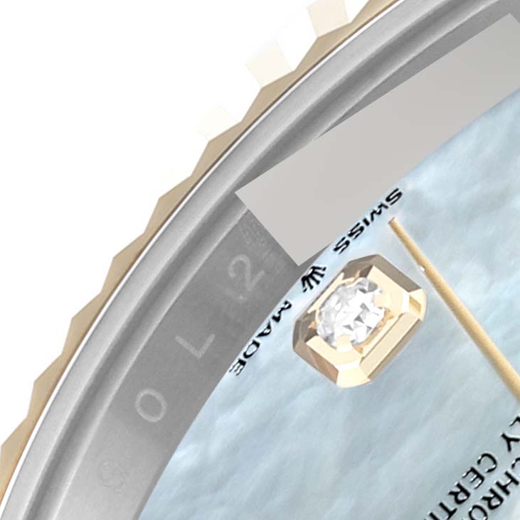 This image shows a close-up of the dial and bezel of a Rolex Datejust 41 126333 Men's Steel and Gold (two tone) Mother of Pearl Dial 126333 Men's Steel and Gold (two tone) Mother of Pearl Dial watch, highlighting the diamond marker and details.