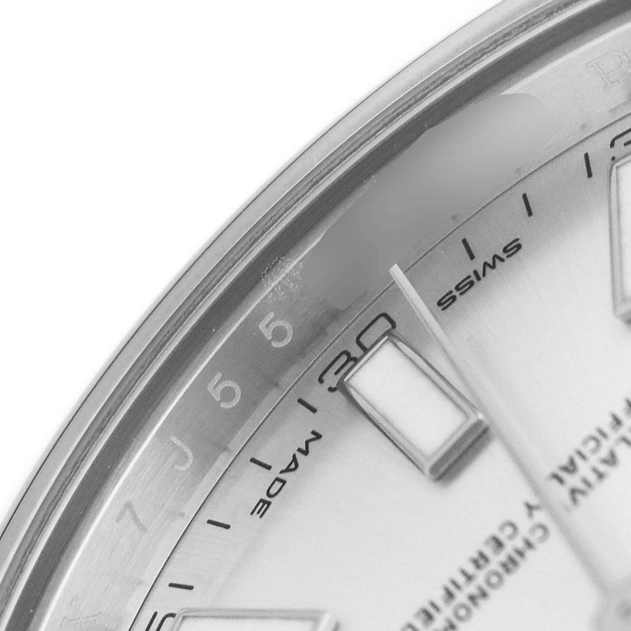 This close-up shows the dial and indices of the Rolex Datejust 41 116300 Men's Stainless Steel Silver Dial, highlighting the date, markers, and partial text on the face.
