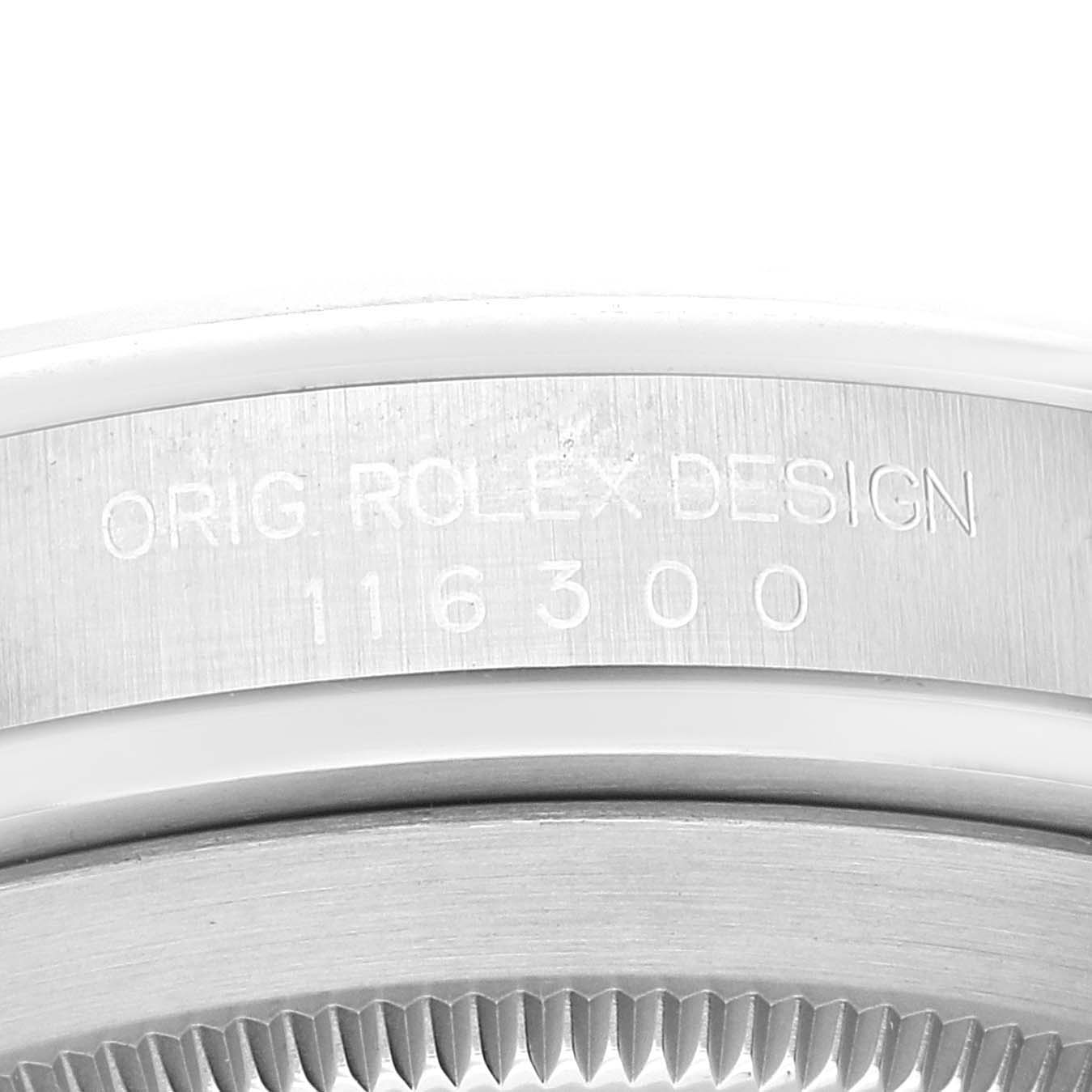 This image shows a close-up of the engravings on the side of the Rolex Datejust 41 116300 Men
s Stainless Steel Blue Dial 116300 Men
s Stainless Steel Blue Dial watch case and part of its fluted bezel.