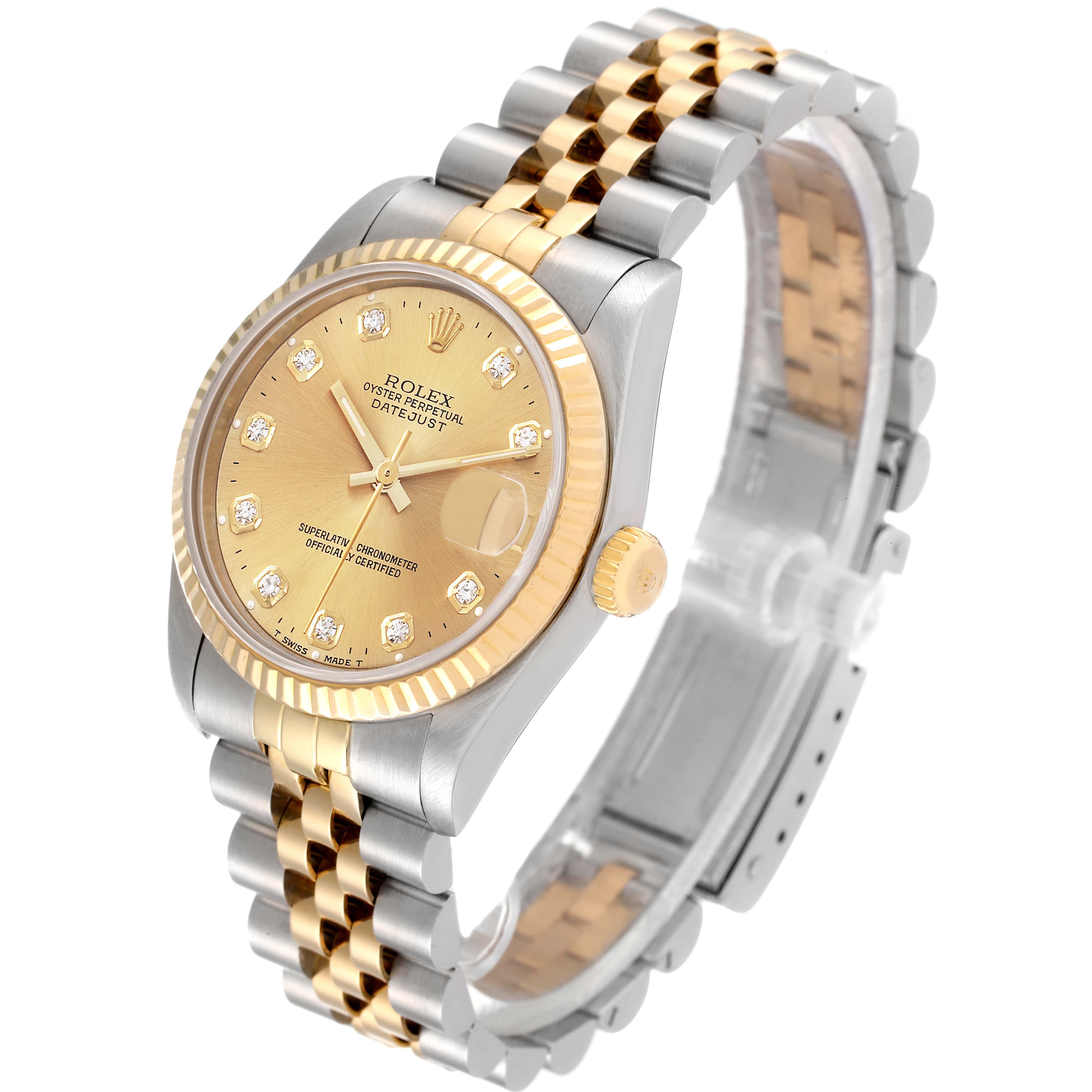 The image shows a Rolex Mid-Size 68273 Women
s Steel and Gold (two tone) Champagne Dial 68273 Women
s Steel and Gold (two tone) Champagne Dial Datejust watch at an angled view, displaying the dial, bezel, crown, and bracelet.