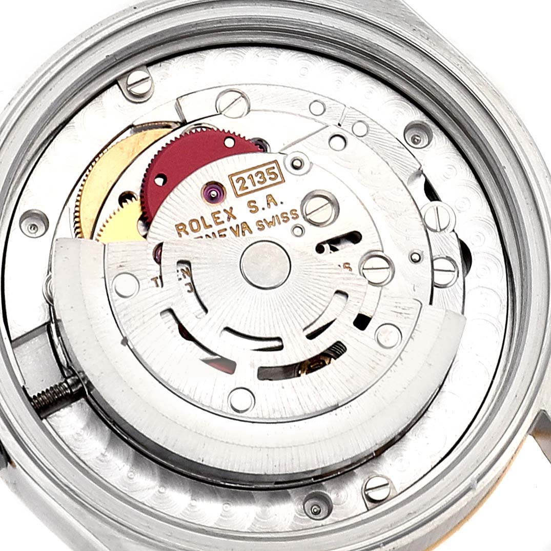 This image shows the internal mechanism of a Rolex Mid-Size 68273 Women
s Steel and Gold (two tone) Champagne Dial 68273 Women
s Steel and Gold (two tone) Champagne Dial model watch from a top-down angle, highlighting its intricate components.