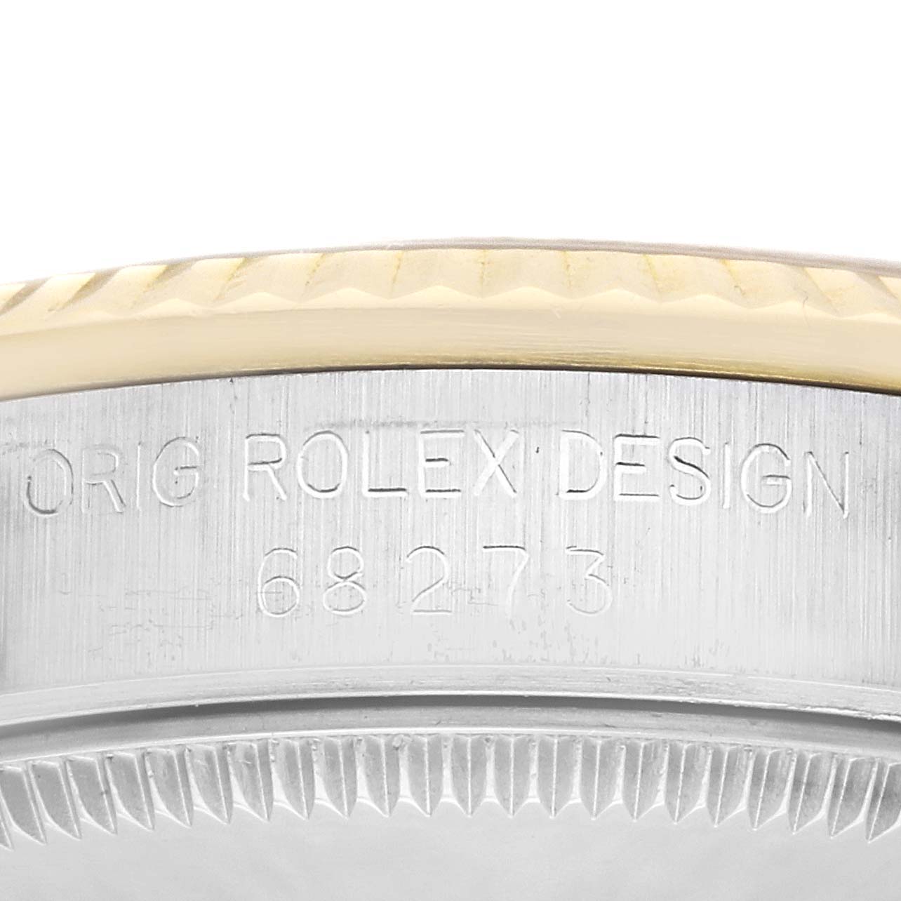 The image shows the engraved side of the case of a Mid-Size Rolex watch model 68273.