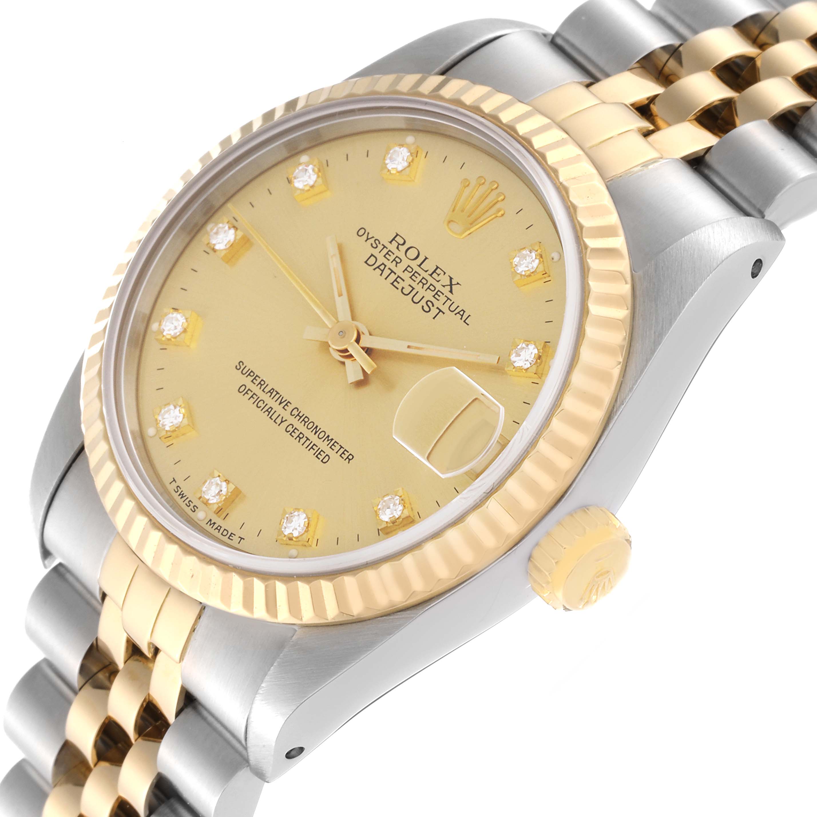 This is a side angle of the Rolex Mid-Size 68273 Women's Steel and Gold (two tone) Champagne Dial 68273 Women's Steel and Gold (two tone) Champagne Dial Oyster Perpetual Datejust watch, showcasing its dial, bezel, and bracelet.
