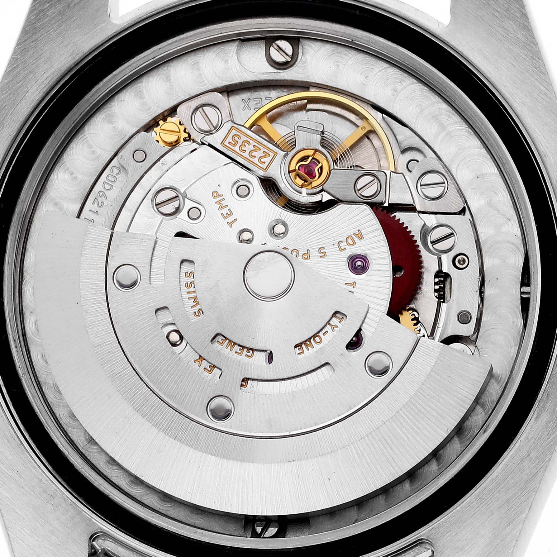 This image shows a close-up of the movement and inner mechanics of a Rolex Mid-Size 178274 Women
s Stainless Steel Silver Dial 178274 Women
s Stainless Steel Silver Dial watch.