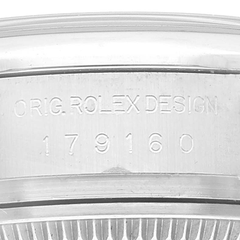 The image shows a close-up of the side of a Rolex Datejust 179160 Women's Stainless Steel Pink Dial 179160 Women's Stainless Steel Pink Dial watch case, highlighting the engraved model number "179160."