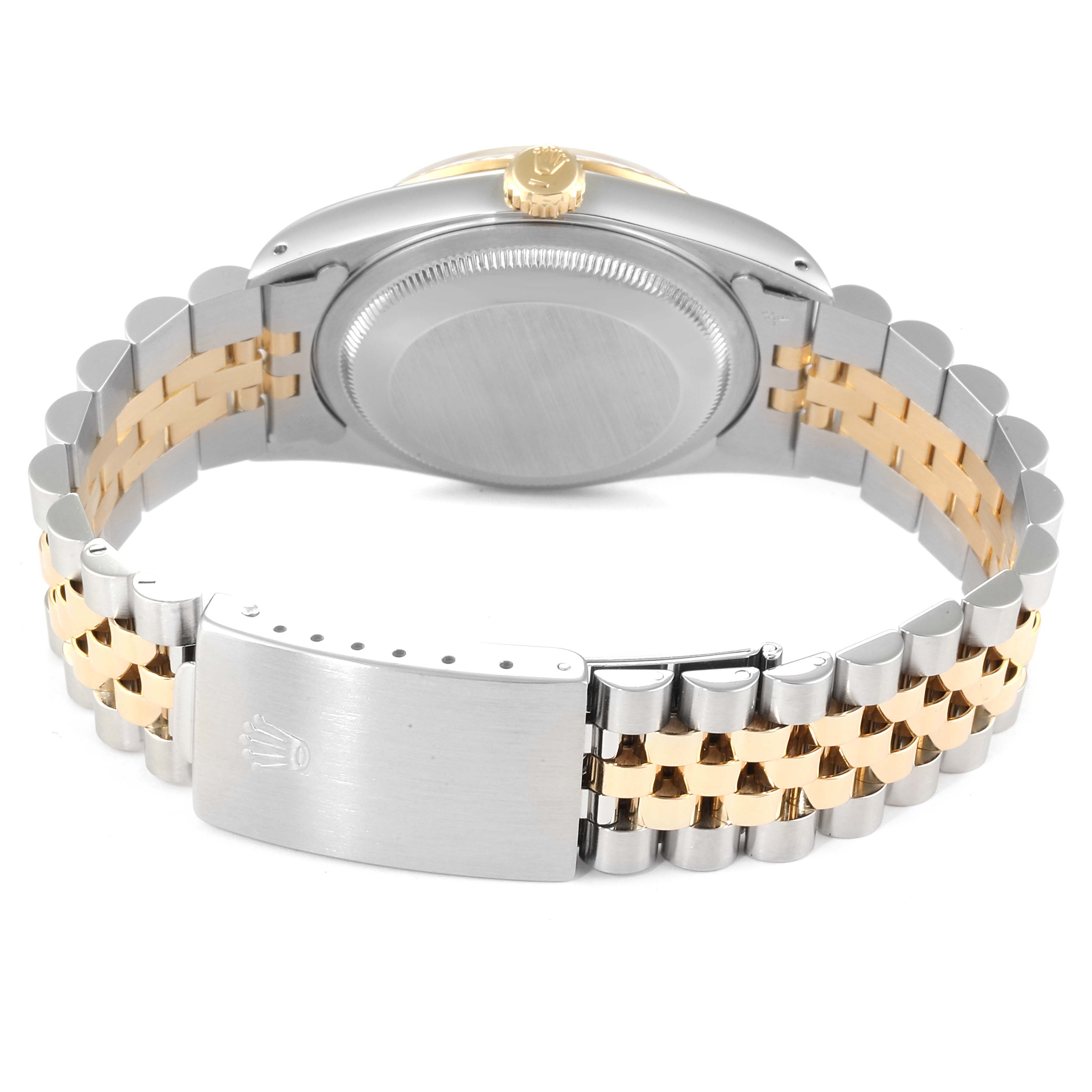 The Rolex Datejust 16233 Men's Steel and Gold (two tone) Champagne Dial 16233 Men's Steel and Gold (two tone) Champagne Dial watch is shown from the back, highlighting its clasp, band, and case back.