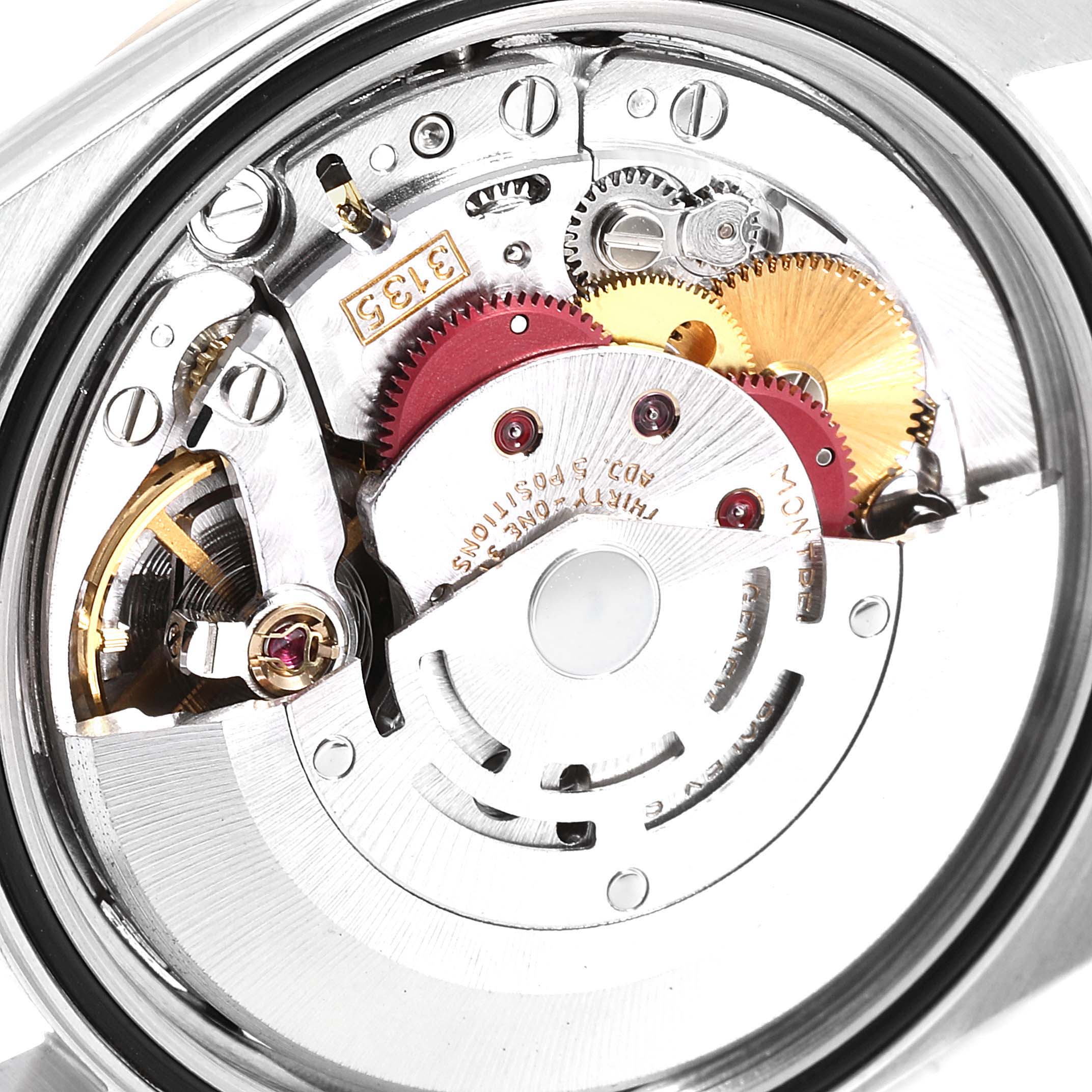 This is an image of the movement mechanism of a Rolex Datejust 16233 Men's Steel and Gold (two tone) Champagne Dial 16233 Men's Steel and Gold (two tone) Champagne Dial watch, viewed from the back.