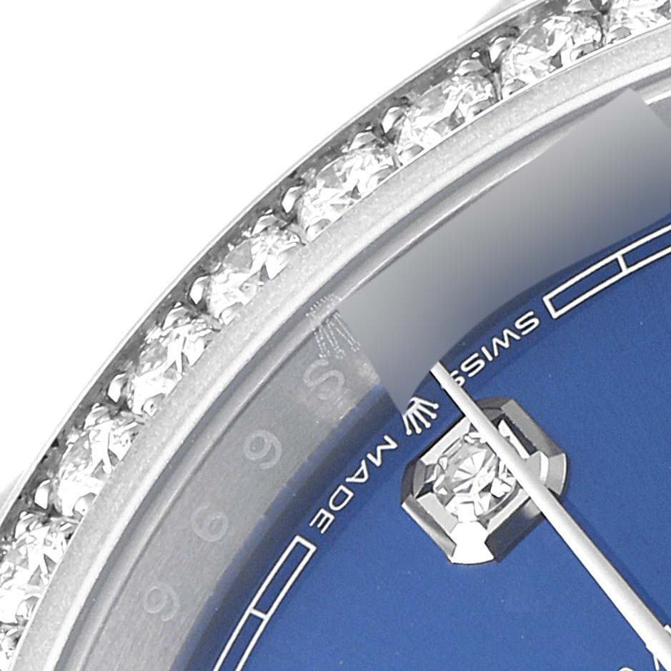 The image shows a close-up of the dial and bezel with diamonds of a Rolex Datejust 126284 Men's Stainless Steel Blue Dial 126284 Men's Stainless Steel Blue Dial watch, highlighting the "Swiss Made" text.