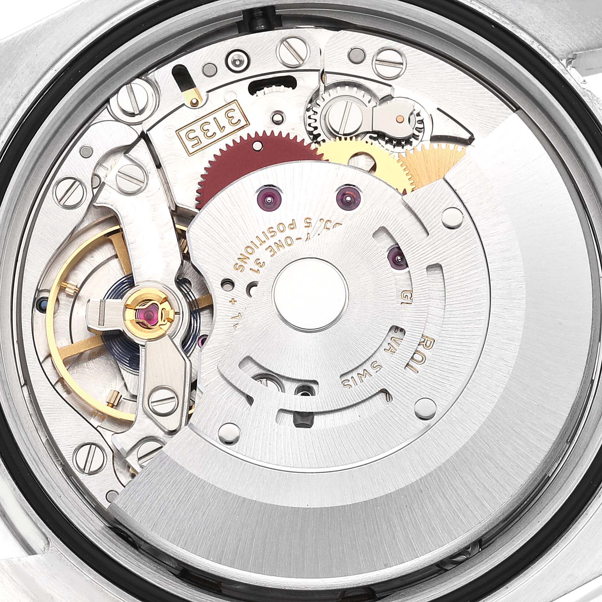 This image shows the internal mechanism of a Rolex Datejust 116234 Men
s Stainless Steel Black Dial 116234 Men
s Stainless Steel Black Dial model, focusing on the movement and gears.