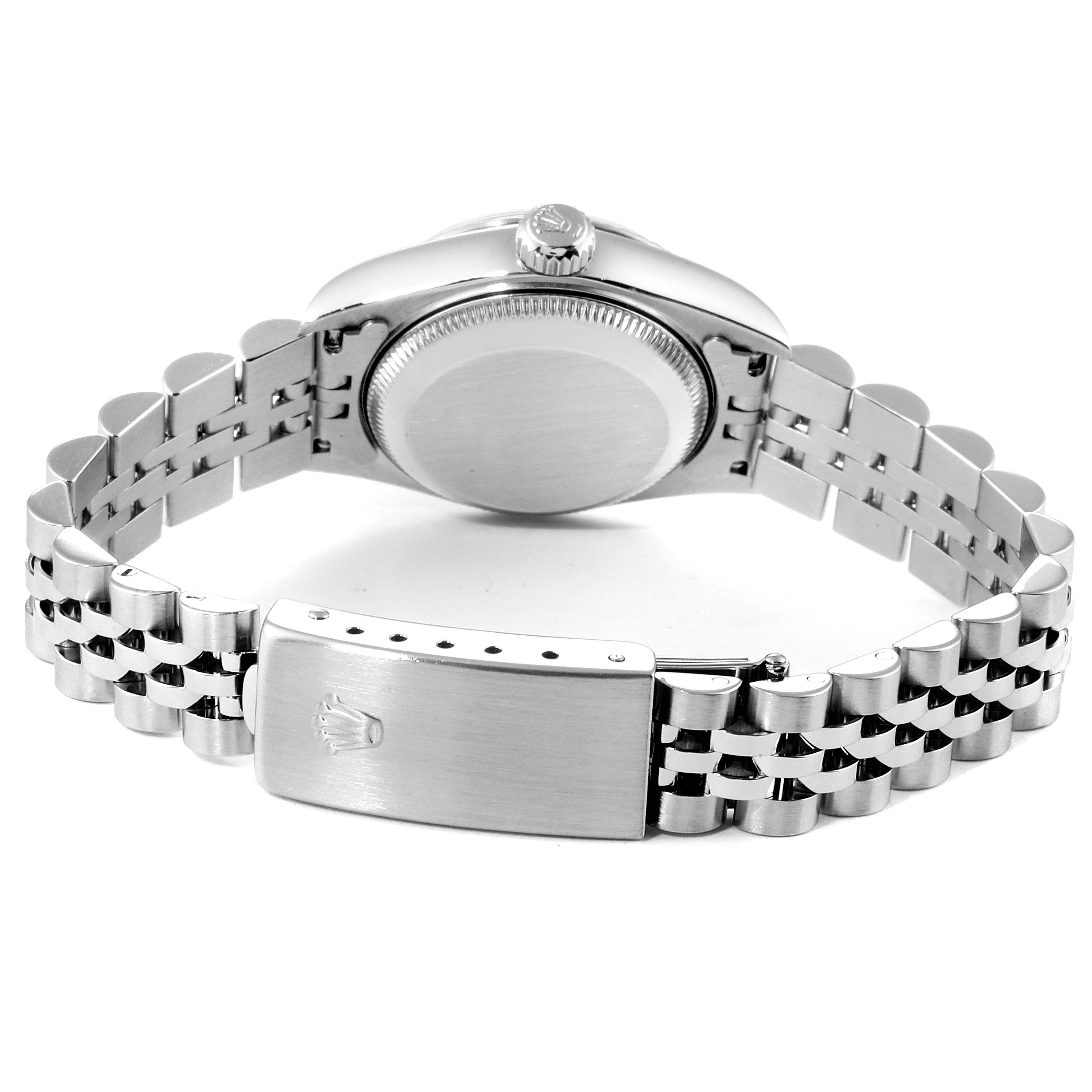The image shows the back view of a Rolex Datejust 69174 Women
s Stainless Steel Silver Dial 69174 Women
s Stainless Steel Silver Dial watch featuring its bracelet and the clasp.