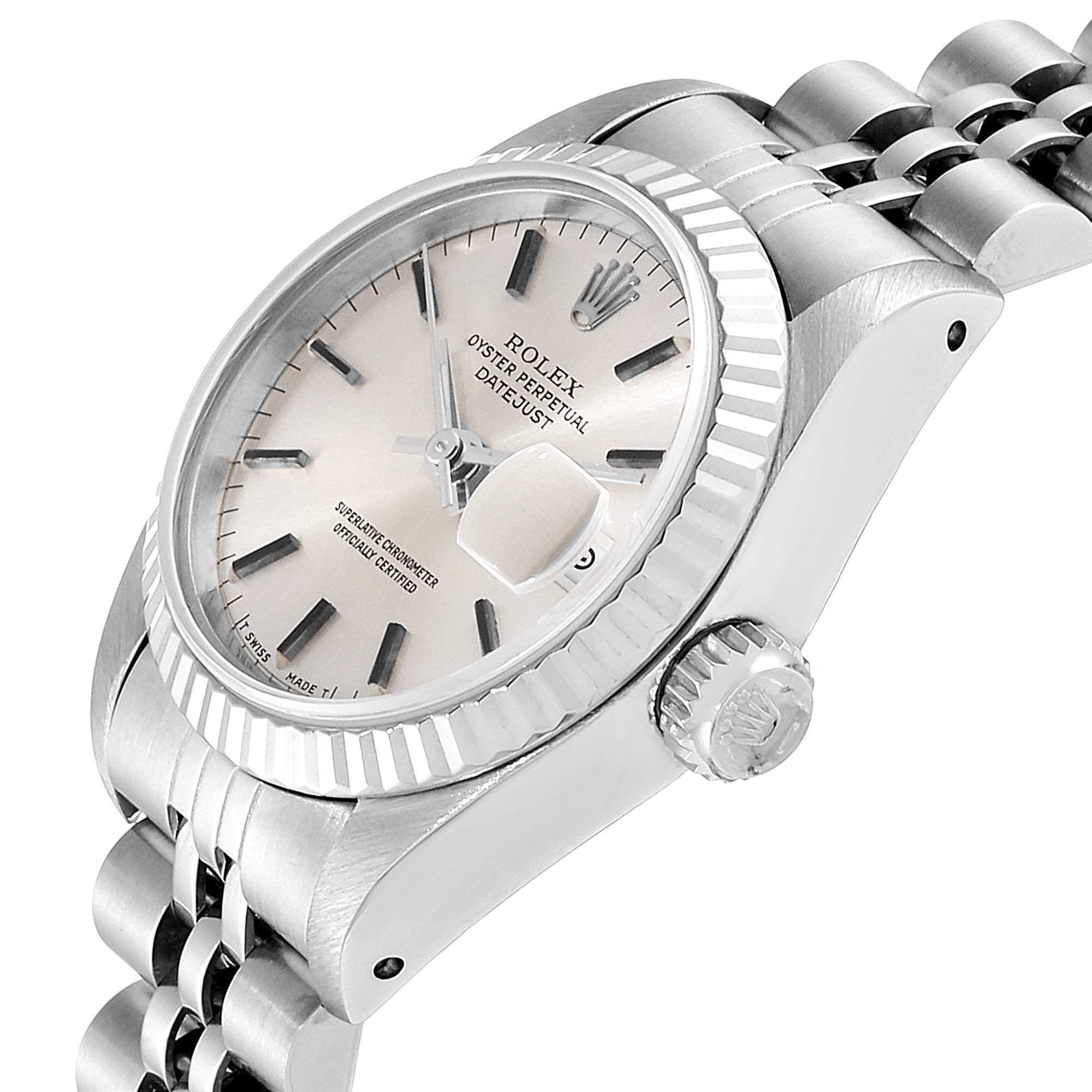 This image shows a side view of the Rolex Datejust 69174 Women
s Stainless Steel Silver Dial 69174 Women
s Stainless Steel Silver Dial watch, highlighting the dial, bezel, crown, and part of the bracelet.