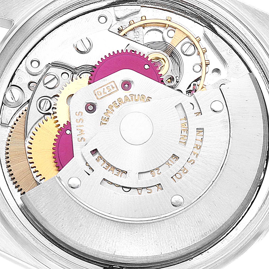 This image shows the internal mechanism of a Vintage Collection Rolex watch, highlighting gears and intricate components.