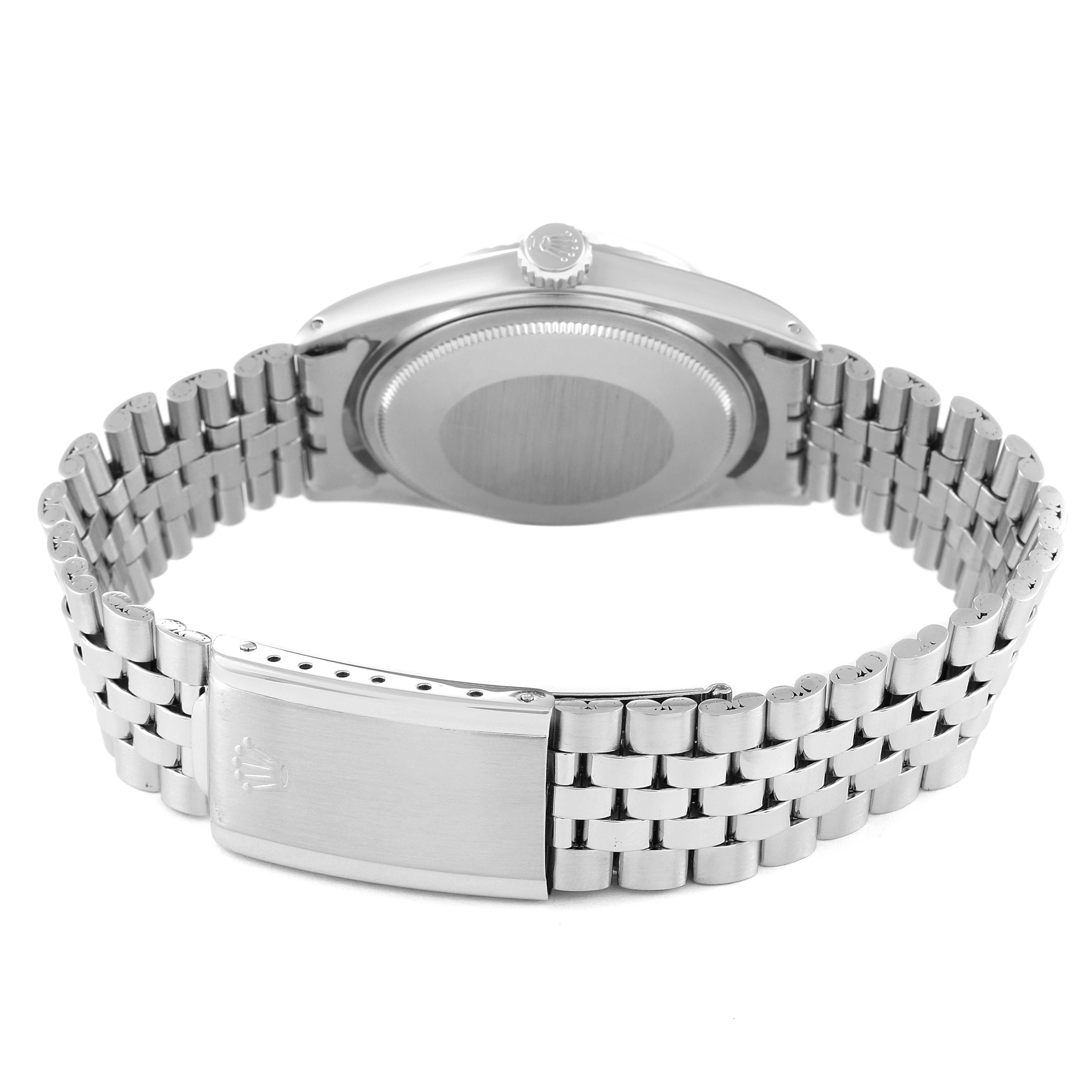 The image shows the back case, crown, and bracelet of a Rolex Vintage Collection 1601 Men's Stainless Steel Silver Dial 1601 Men's Stainless Steel Silver Dial model watch from a rear angle.