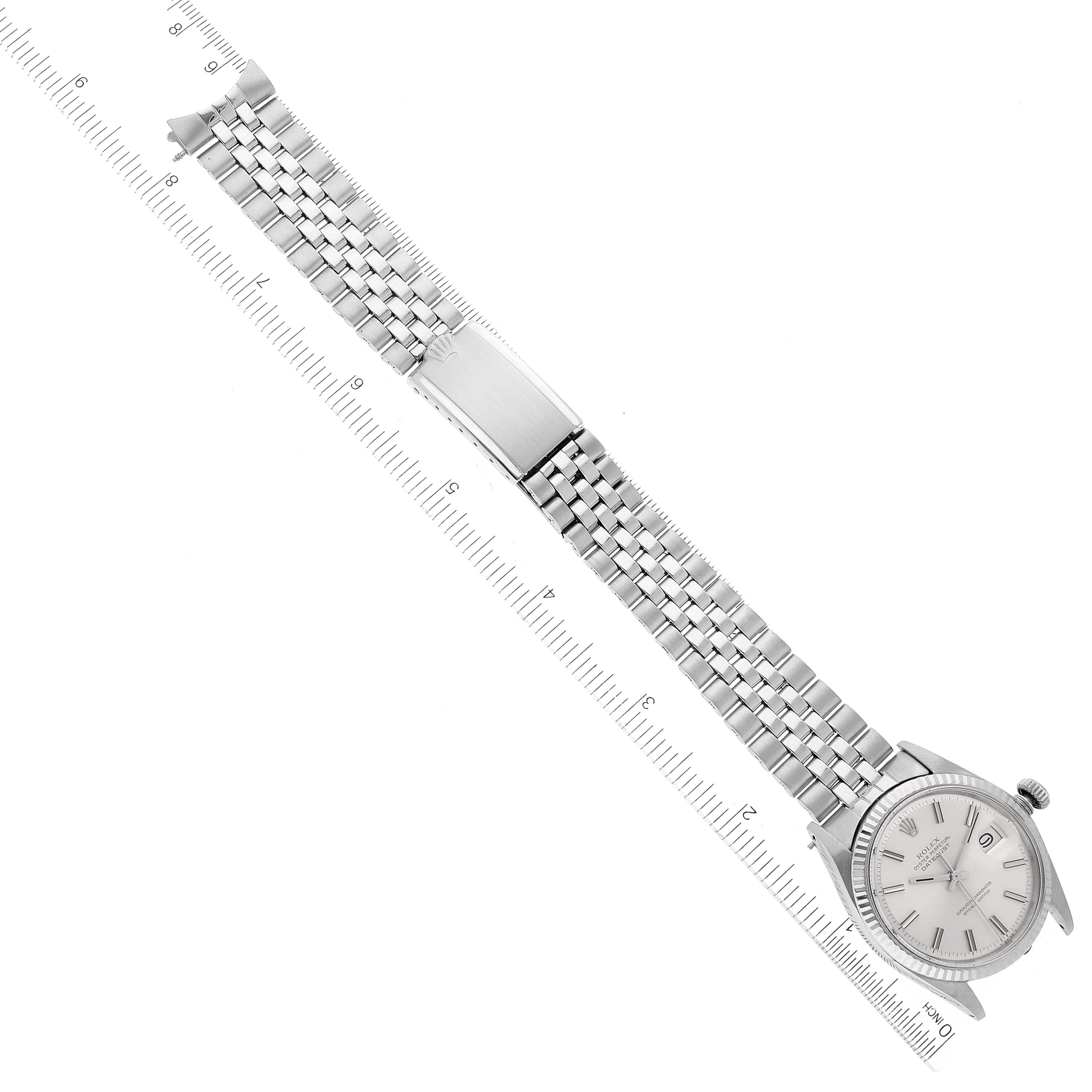 The Rolex Vintage Collection 1601 Men
s Stainless Steel Silver Dial 1601 Men
s Stainless Steel Silver Dial model is shown in an overhead view, displaying the full watch band, clasp, and watch face.