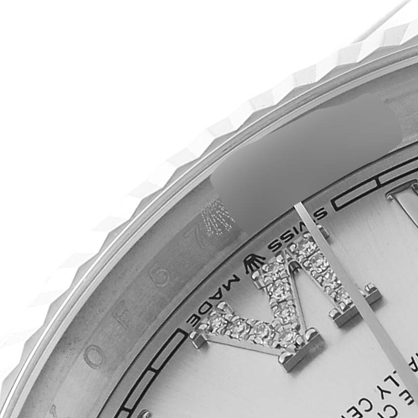Close-up view of the bezel and part of the dial of a Rolex Datejust 126234 Men's Stainless Steel Silver Dial 126234 Men's Stainless Steel Silver Dial watch, displaying the "Swiss Made" marking and hour markers.