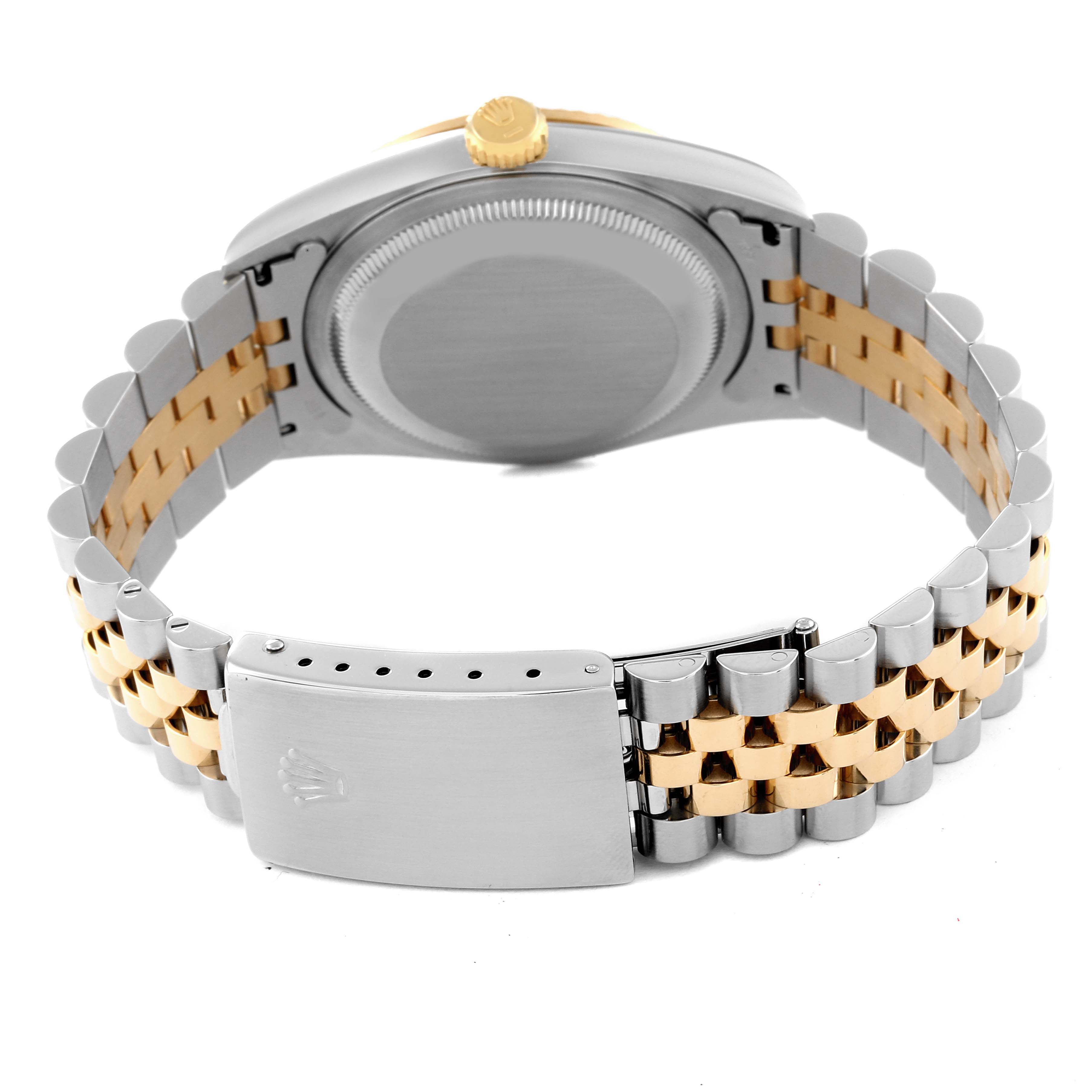 The image shows the back case, crown, and two-tone bracelet of a Rolex Datejust 16233 Men's Steel and Gold (two tone) Champagne Dial 16233 Men's Steel and Gold (two tone) Champagne Dial watch.