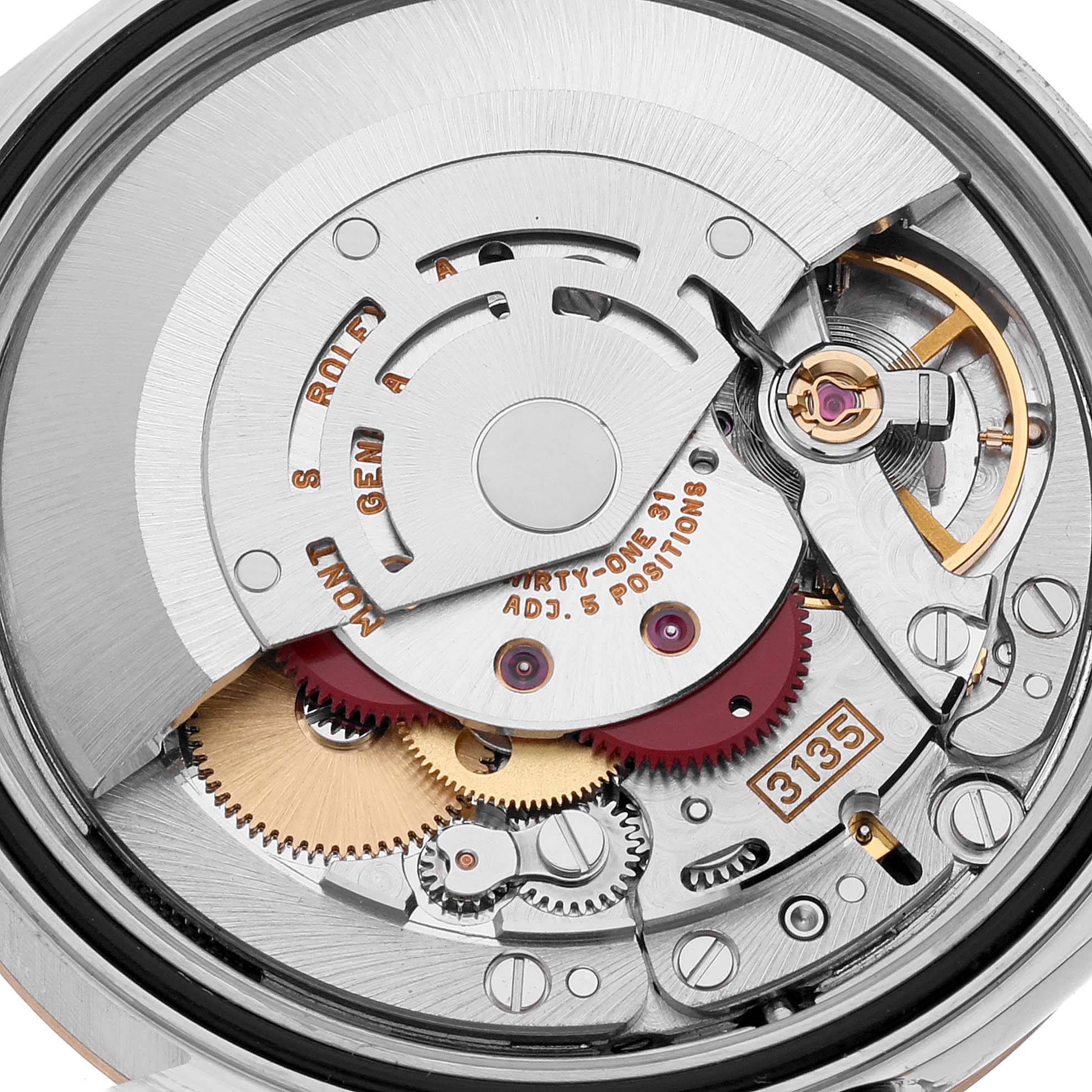 This image shows the intricate internal mechanism of the Rolex Datejust 16233 Men's Steel and Gold (two tone) Champagne Dial 16233 Men's Steel and Gold (two tone) Champagne Dial watch, highlighting the gears and movement components.