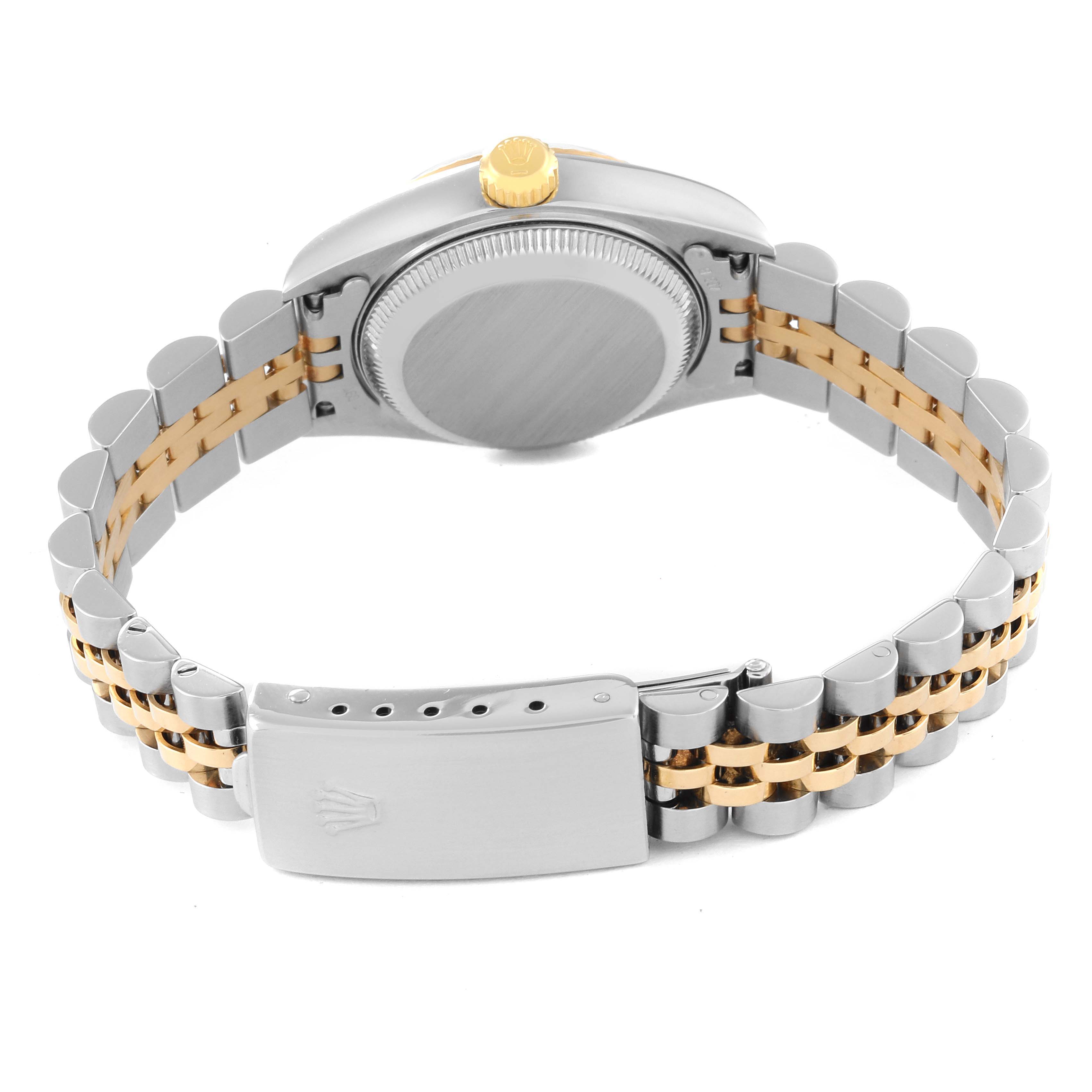 This image shows the back view of a Rolex Datejust 79173 Women's Steel and Gold (two tone) Blue Dial 79173 Women's Steel and Gold (two tone) Blue Dial watch, displaying its case back and metal bracelet with a clasp.