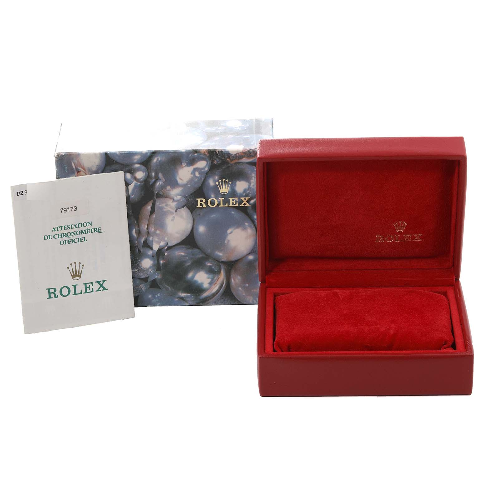 The image shows a Rolex Datejust 79173 Women's Steel and Gold (two tone) Blue Dial 79173 Women's Steel and Gold (two tone) Blue Dial's red watch box, a booklet, and the outer packaging featuring the Rolex logo.