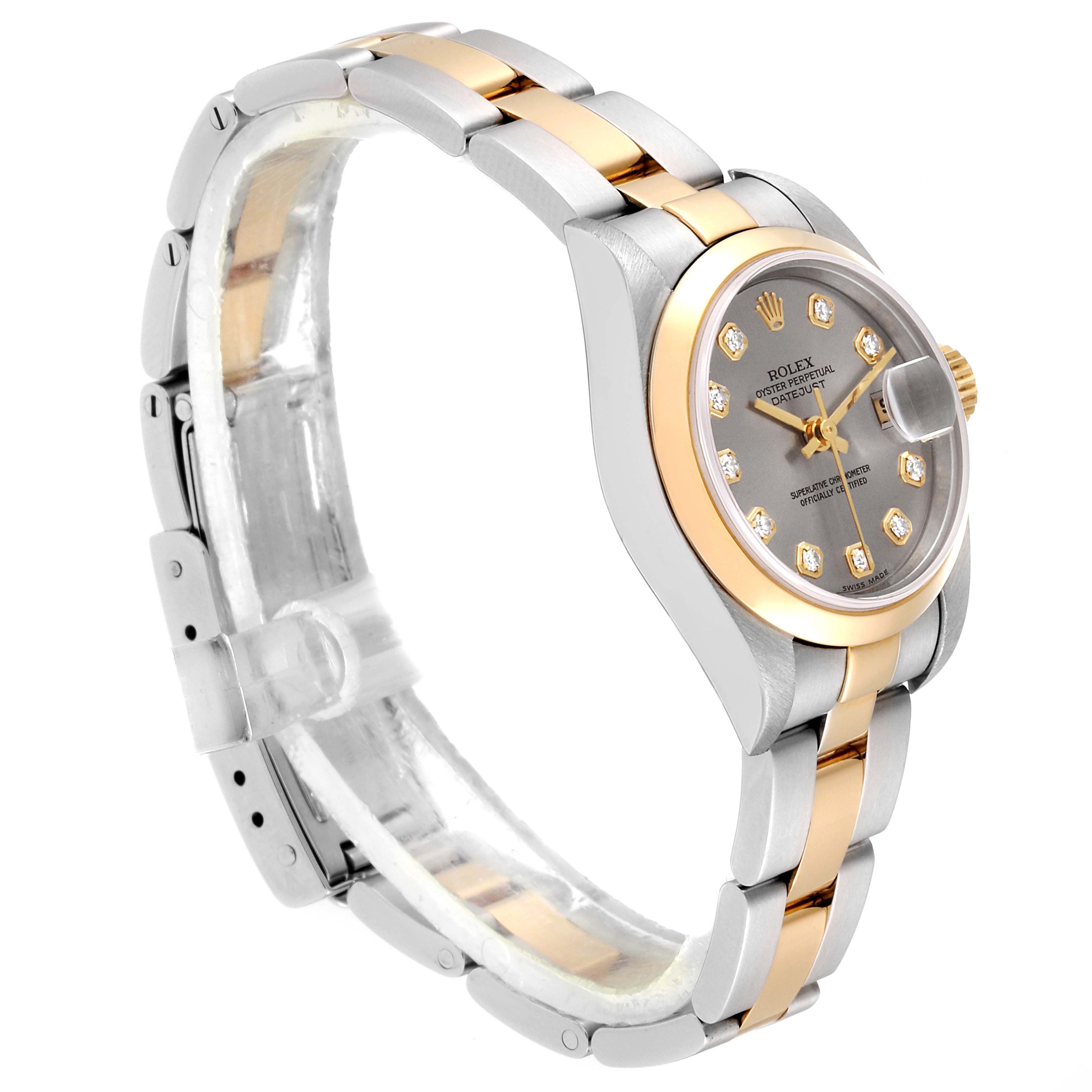 The Rolex Datejust 79163  Women
s Steel and Gold (two tone) Grey Dial 79163  Women
s Steel and Gold (two tone) Grey Dial watch is shown at a 3/4 angle, highlighting its two-tone band, dial, and bezel.