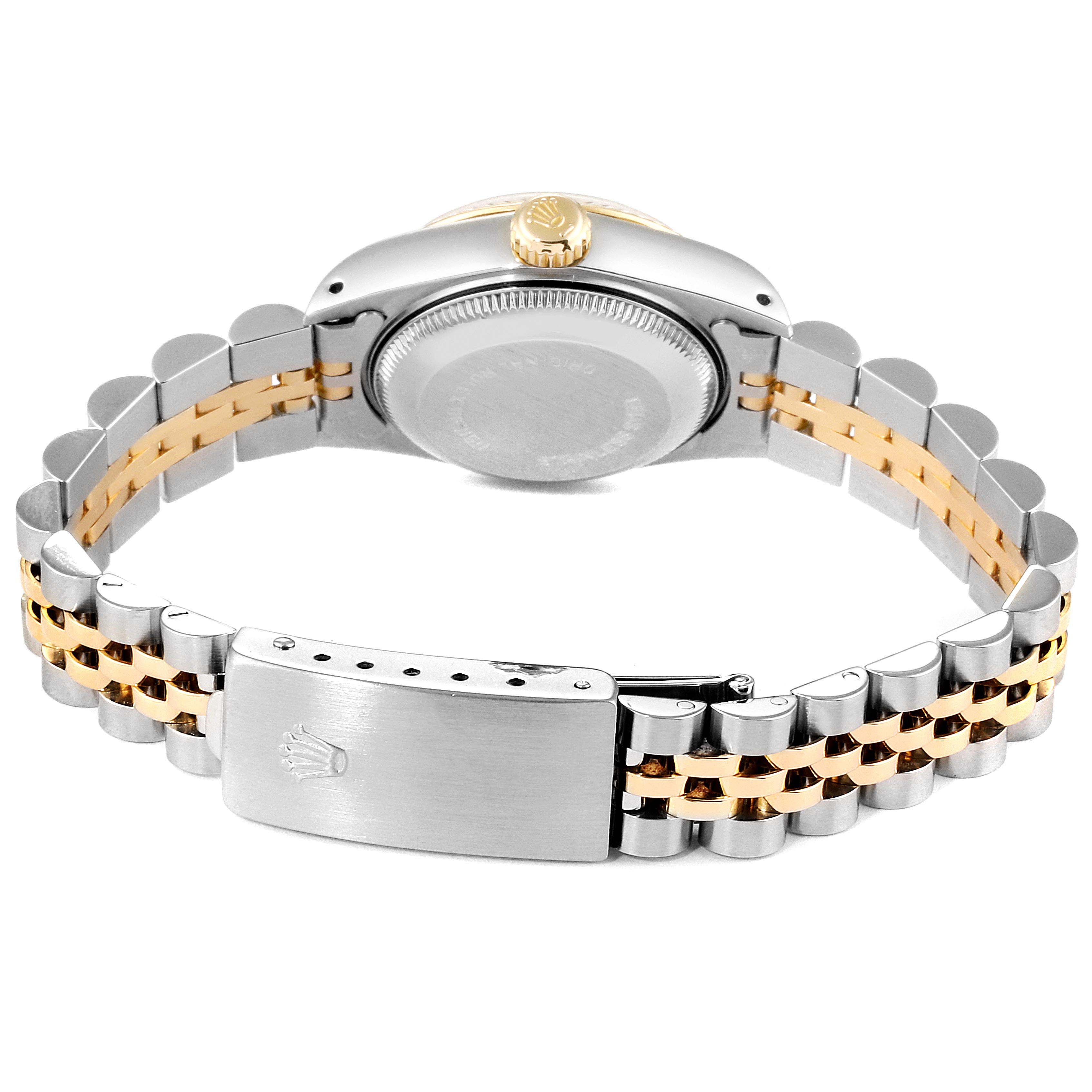 This image shows the back and bracelet of a Rolex Datejust 69173 Women
s Steel and Gold (two tone) Champagne Dial 69173 Women
s Steel and Gold (two tone) Champagne Dial watch with a two-tone metal finish.