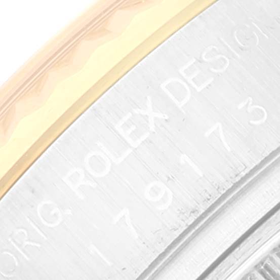 The image shows a close-up of the case side with engraved "Orig ROLEX Design" and model number on a Rolex Datejust 179173 Women's Steel and Gold (two tone) Mother of Pearl Dial 179173 Women's Steel and Gold (two tone) Mother of Pearl Dial.