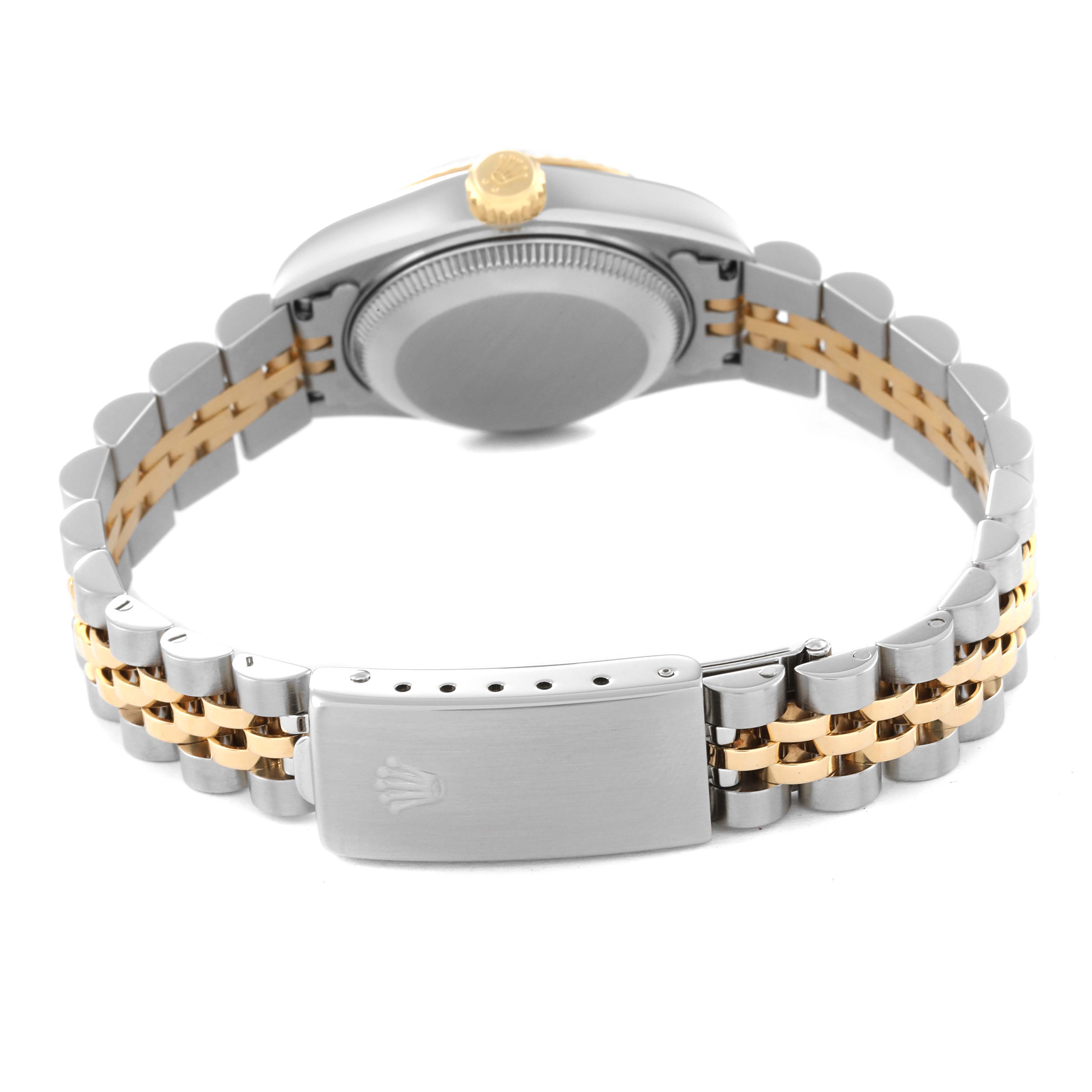 The image shows the back view of a Rolex Datejust 69173 Women's Steel and Gold (two tone) White Dial 69173 Women's Steel and Gold (two tone) White Dial watch, highlighting the case back, crown, and two-tone bracelet with clasp.