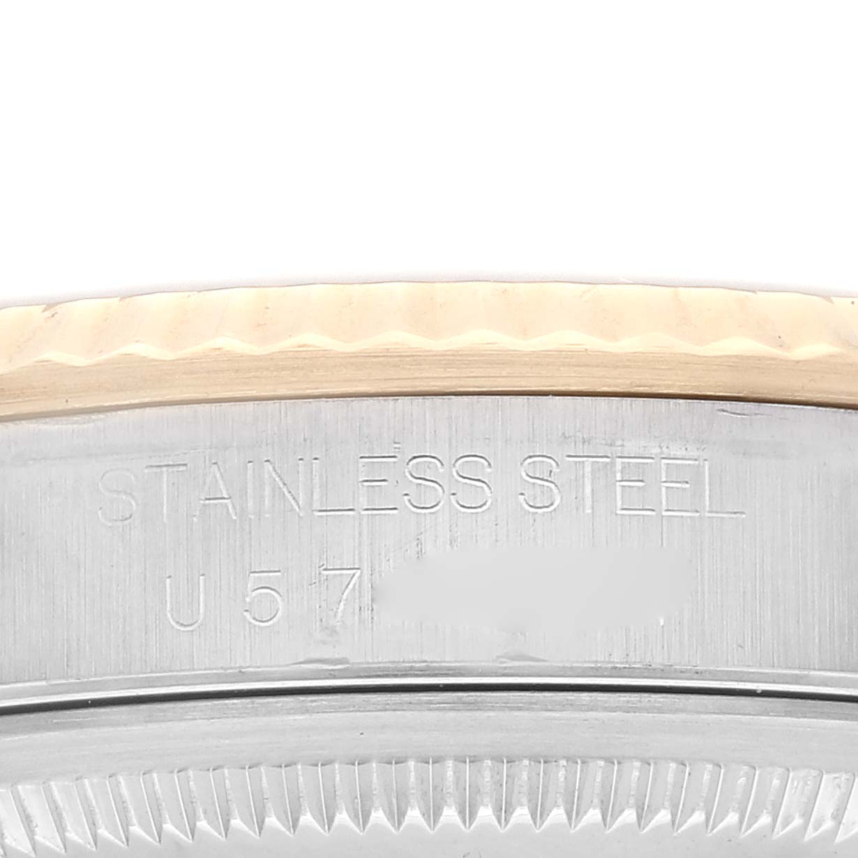 The image shows a close-up view of the stainless steel casing and part of the bezel of a Rolex Datejust 16233 Men's Steel and Gold (two tone) Grey Dial 16233 Men's Steel and Gold (two tone) Grey Dial watch.