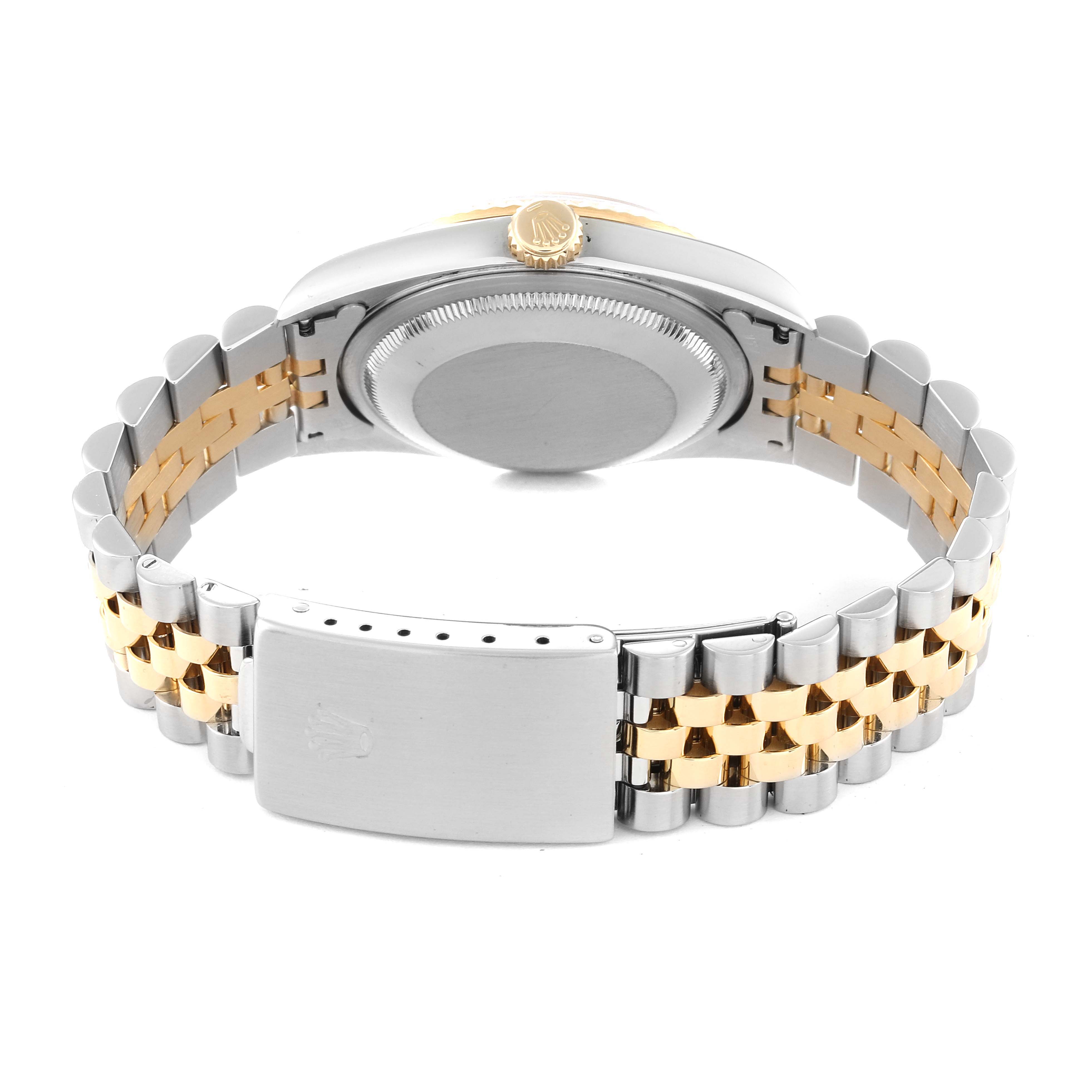 The image shows the back and clasp of a Rolex Datejust 16233 Men's Steel and Gold (two tone) Grey Dial 16233 Men's Steel and Gold (two tone) Grey Dial watch with a two-tone metal bracelet.