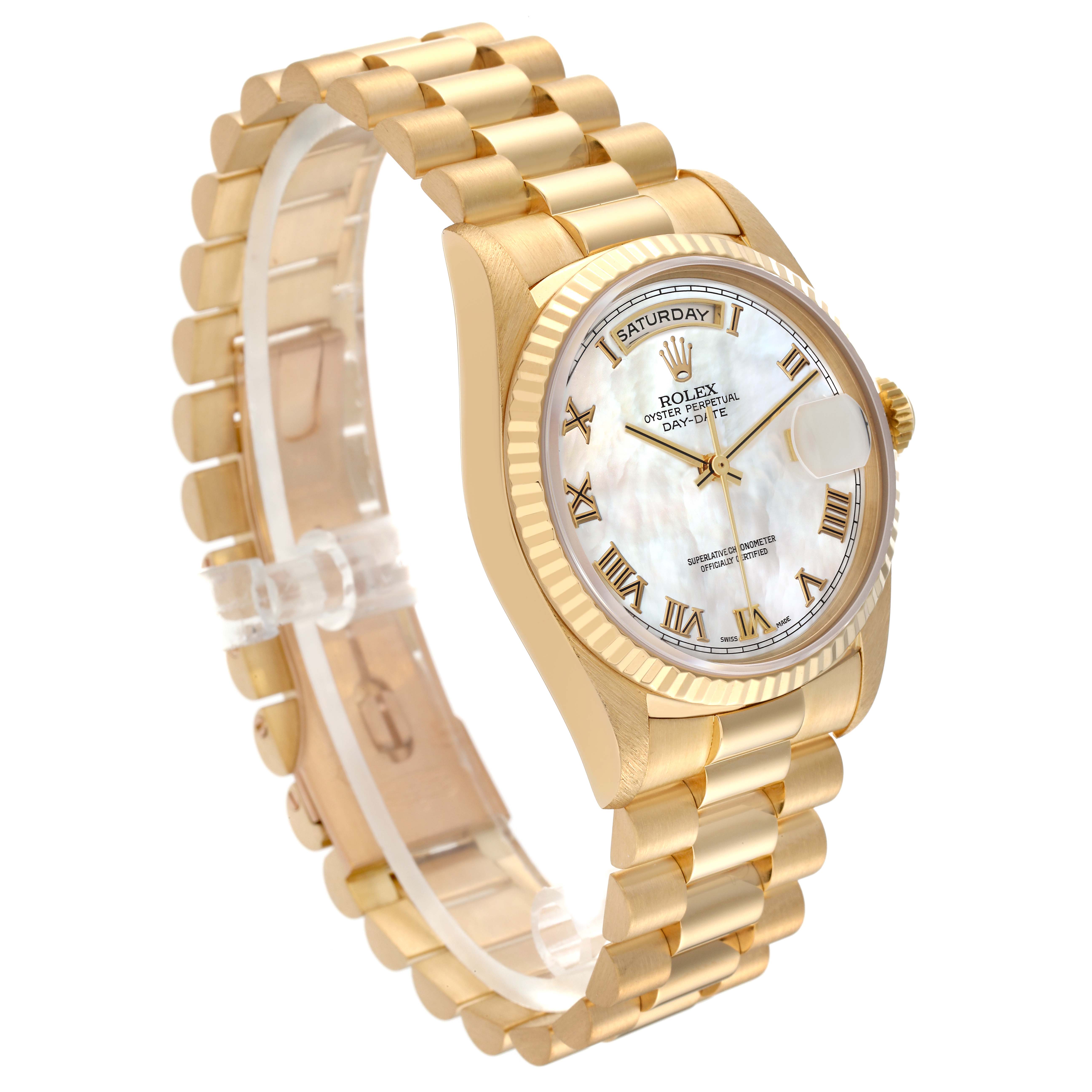 This Rolex President 18238 Men
s Yellow Gold Mother of Pearl Dial 18238 Men
s Yellow Gold Mother of Pearl Dial model watch is shown at a slight angle, highlighting its gold bracelet, case, fluted bezel, and white dial.