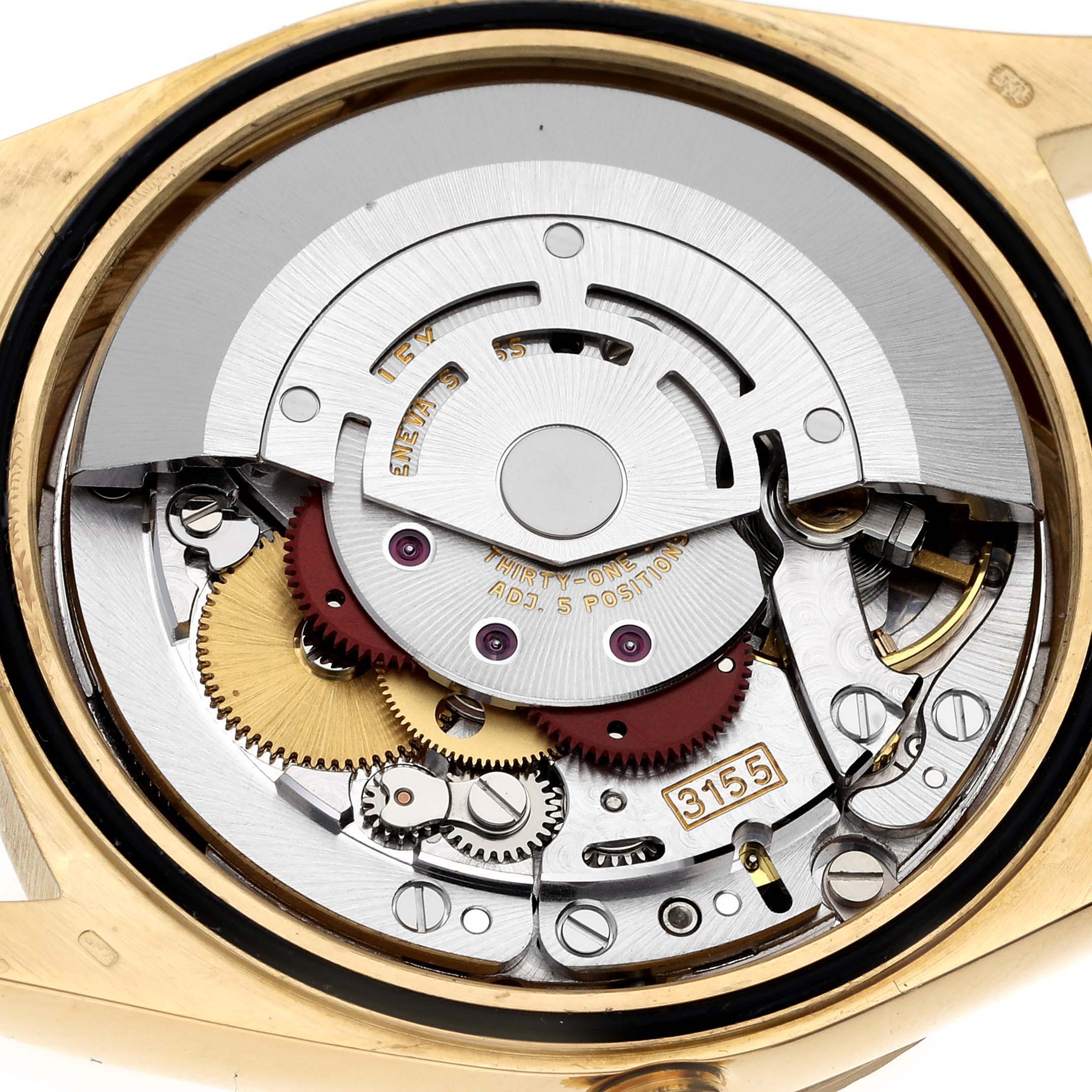 This image shows the internal mechanism of the Rolex President 18238 Men
s Yellow Gold Mother of Pearl Dial 18238 Men
s Yellow Gold Mother of Pearl Dial model watch from a close-up, top-down angle.