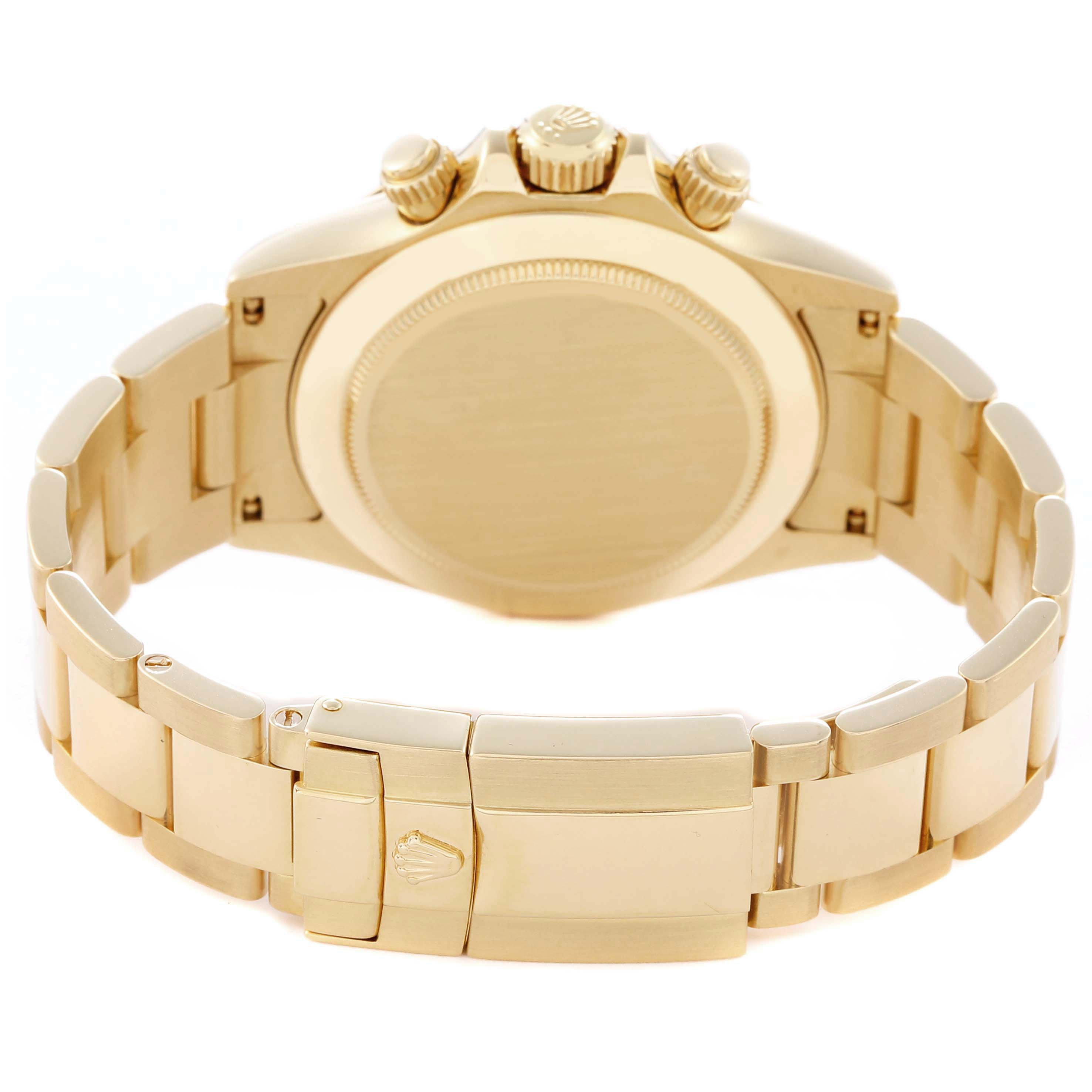 The image shows the back and clasp of a Rolex Daytona 116528 Men
s Yellow Gold Black Dial 116528 Men
s Yellow Gold Black Dial watch, angled to highlight the case back and bracelet.